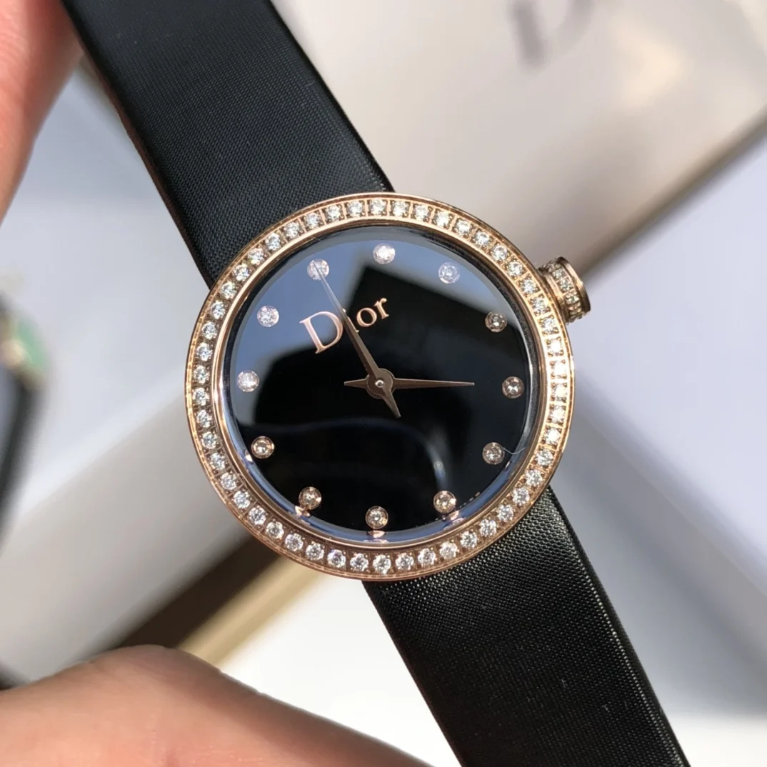 3 Black dial with 12 diamond hour markers — photographed off the sweep