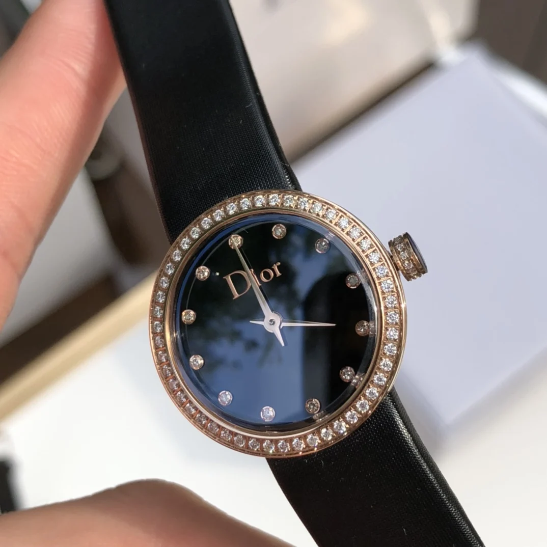 3 Black dial with 12 diamond hour markers — photographed off the sweep