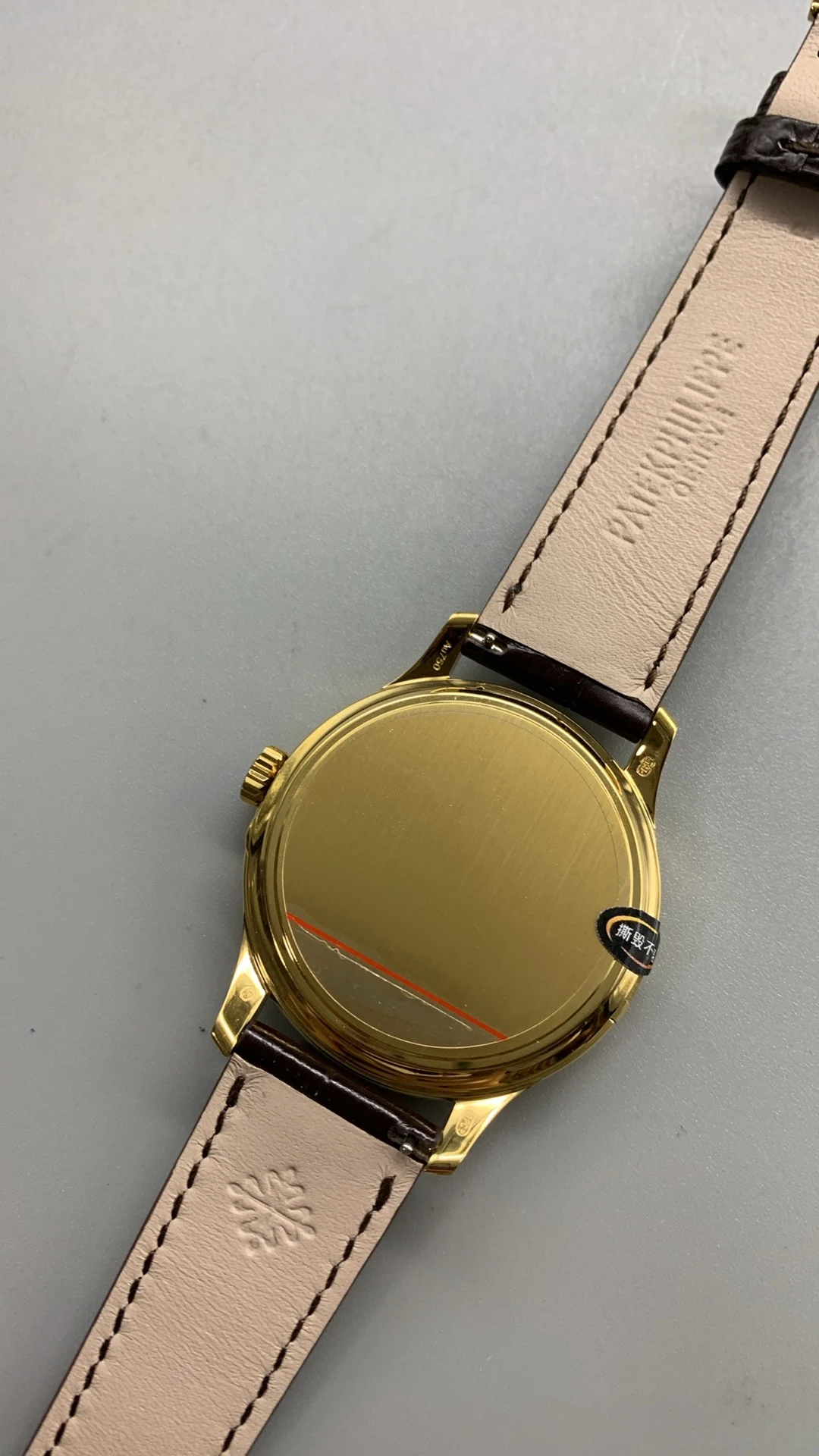 3kf, hinged cover, gold brown leather — photographed off the sweep
