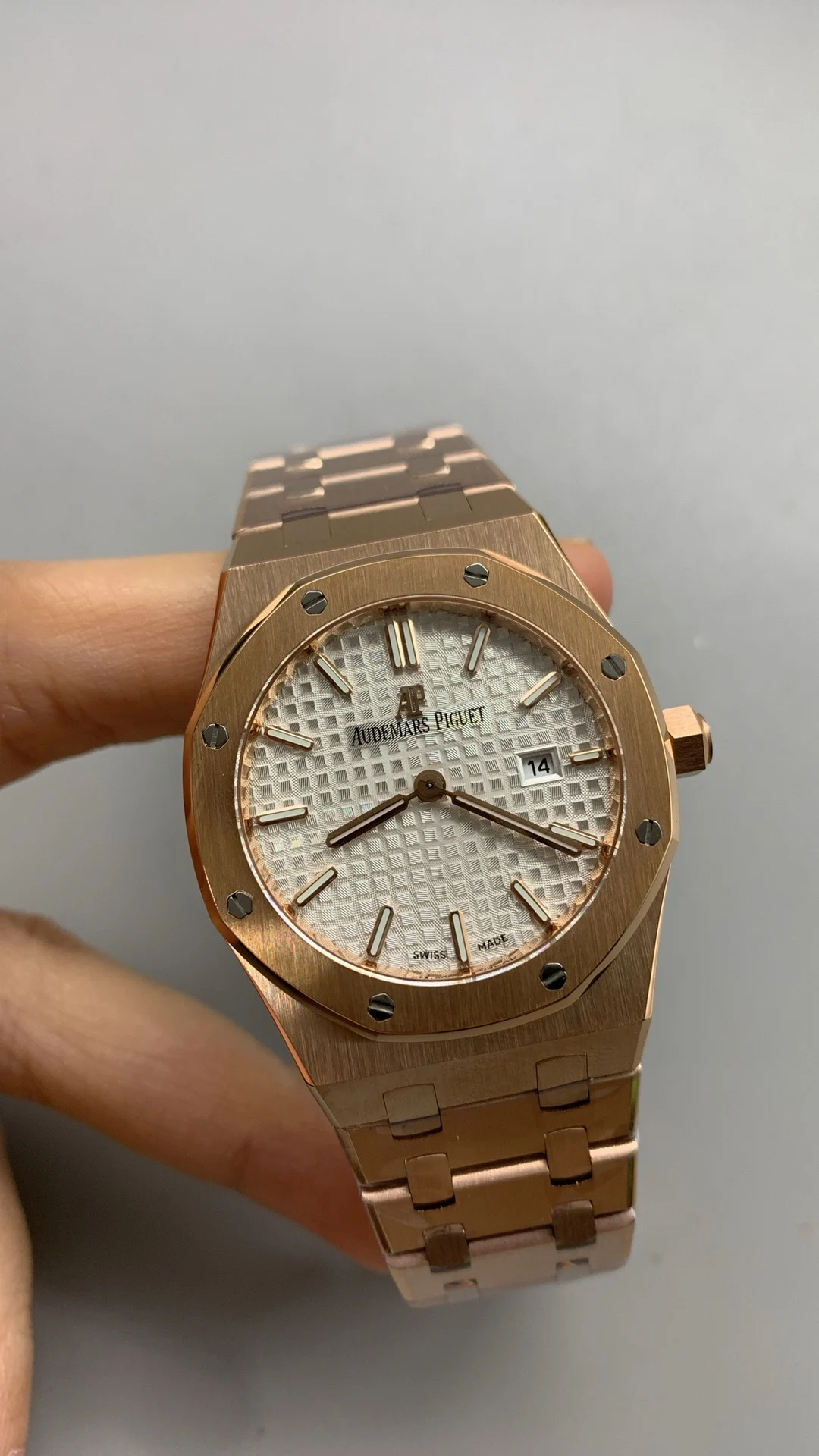 8f, 33mm, rose gold quartz, female ap — photographed off the sweep