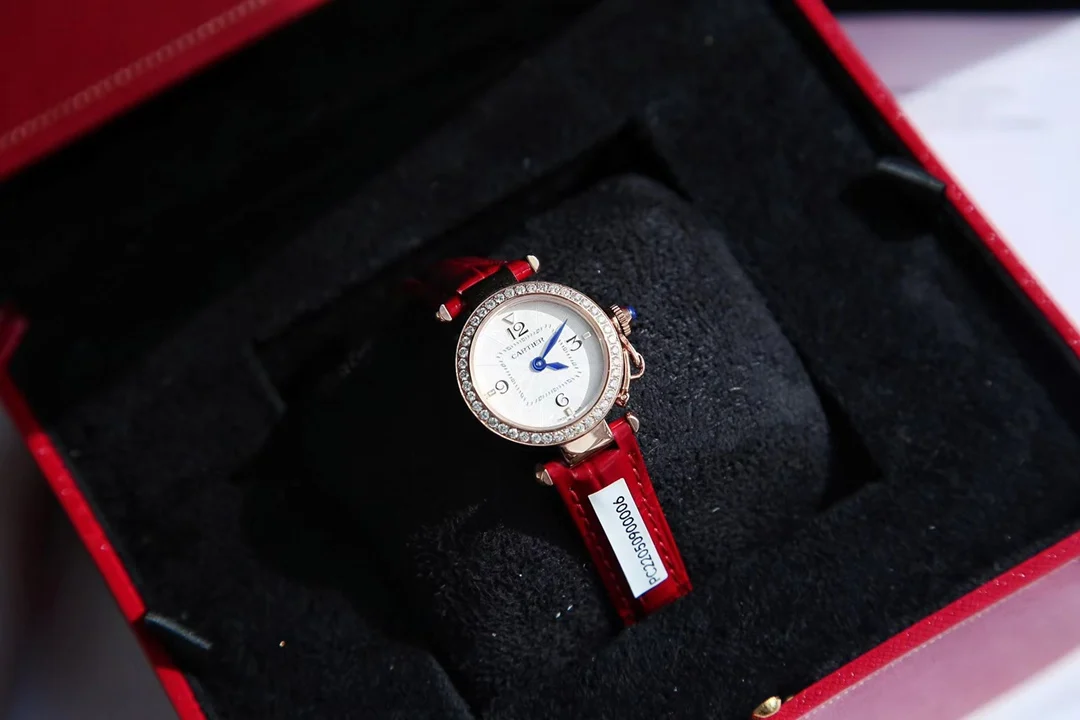 A distinctive red alligator leather strap — photographed off the sweep