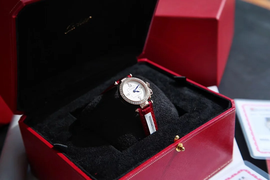 A distinctive red alligator leather strap — photographed off the sweep