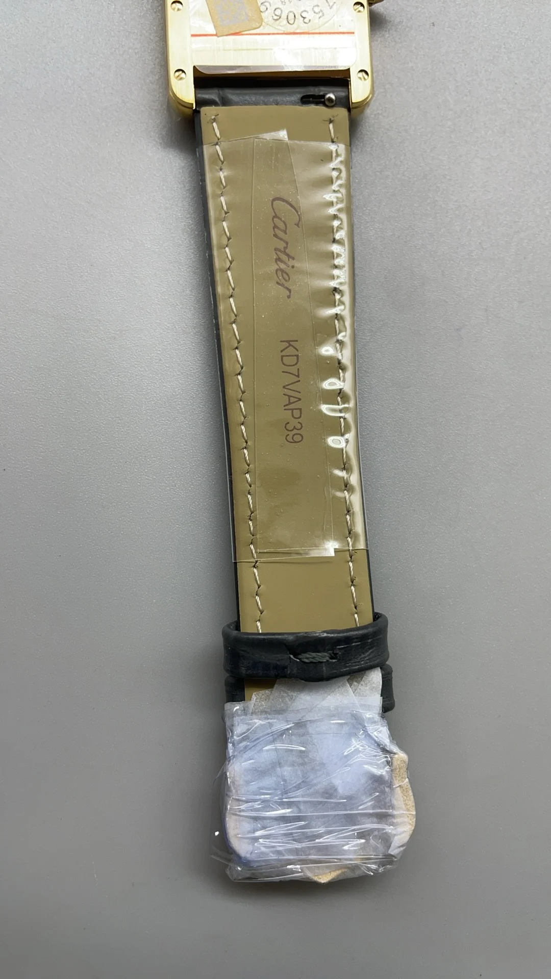 AF, leather strap, medium size, 33.7*25.5mm, golden gray leather — photographed off the sweep