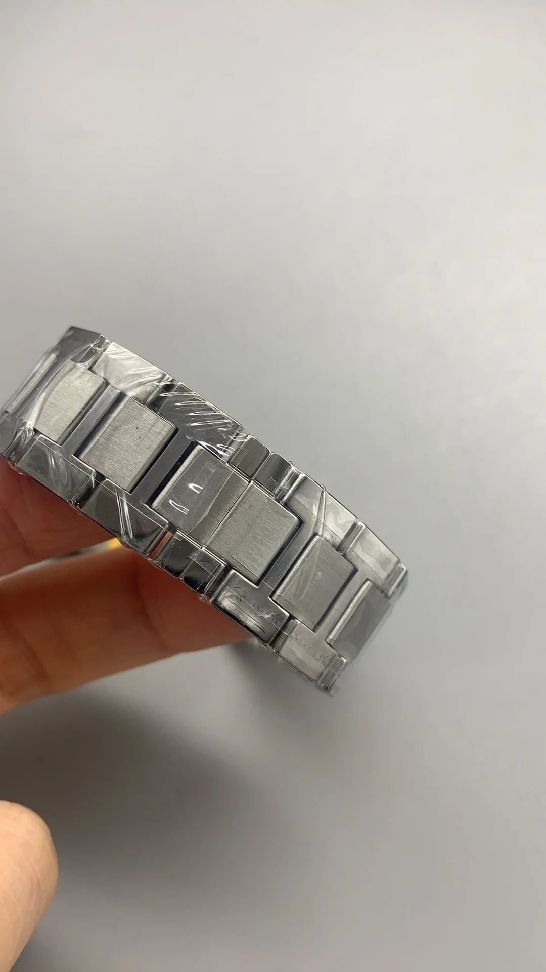 AF, small, solo steel bracelet — photographed off the sweep