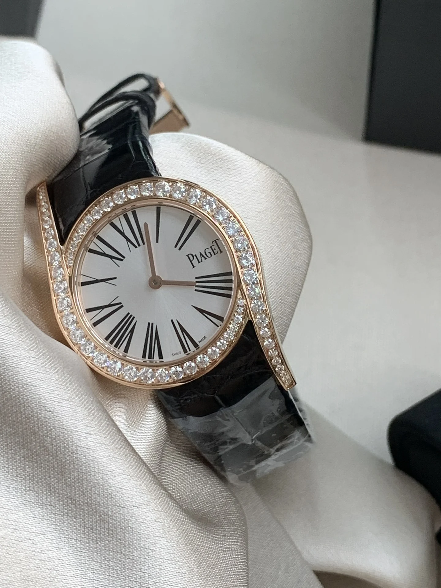 American alligator leather paired with rose gold, plus Roman