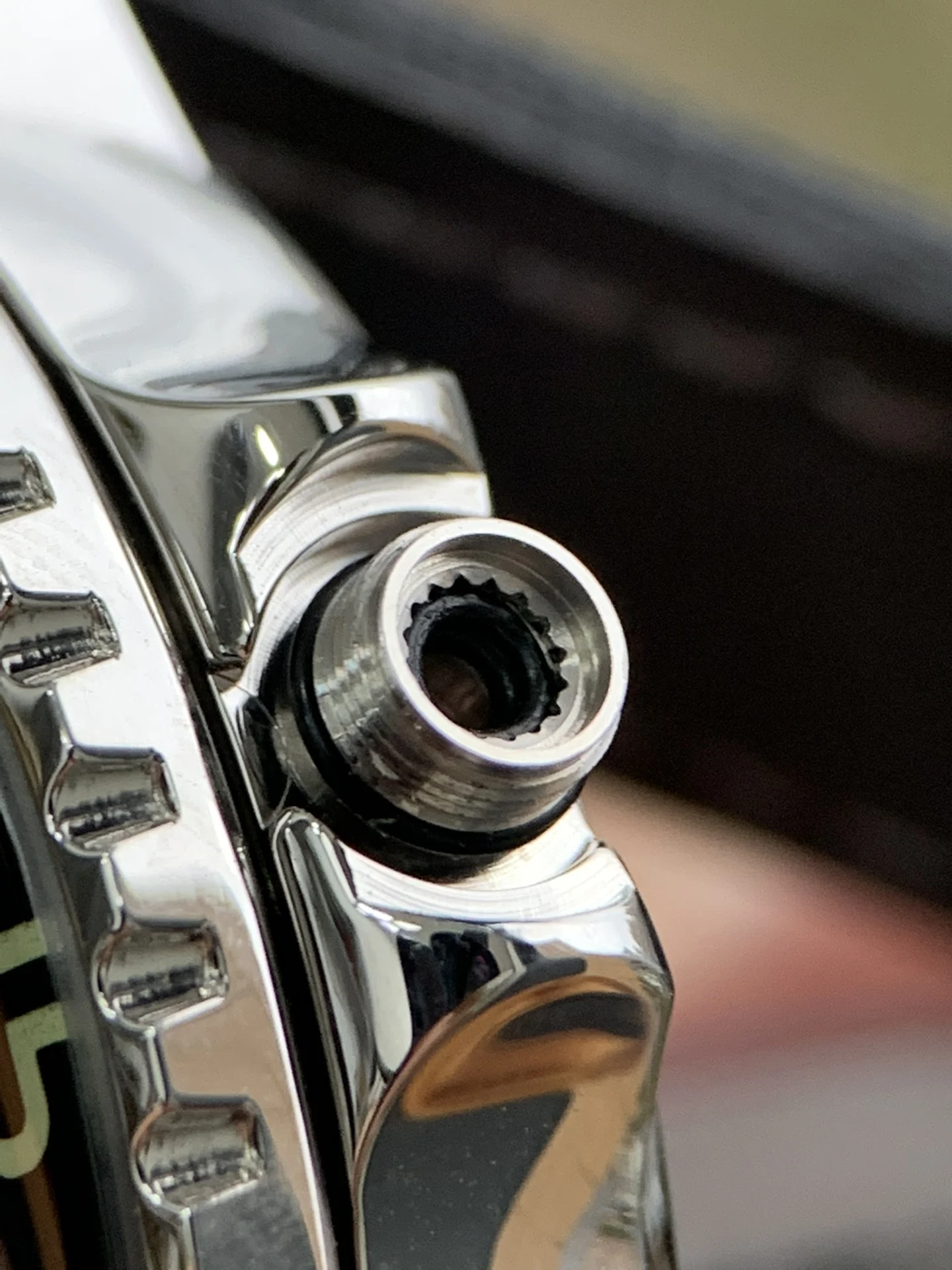 As a diving watch, the crown is the key to water resistance — photographed off the sweep