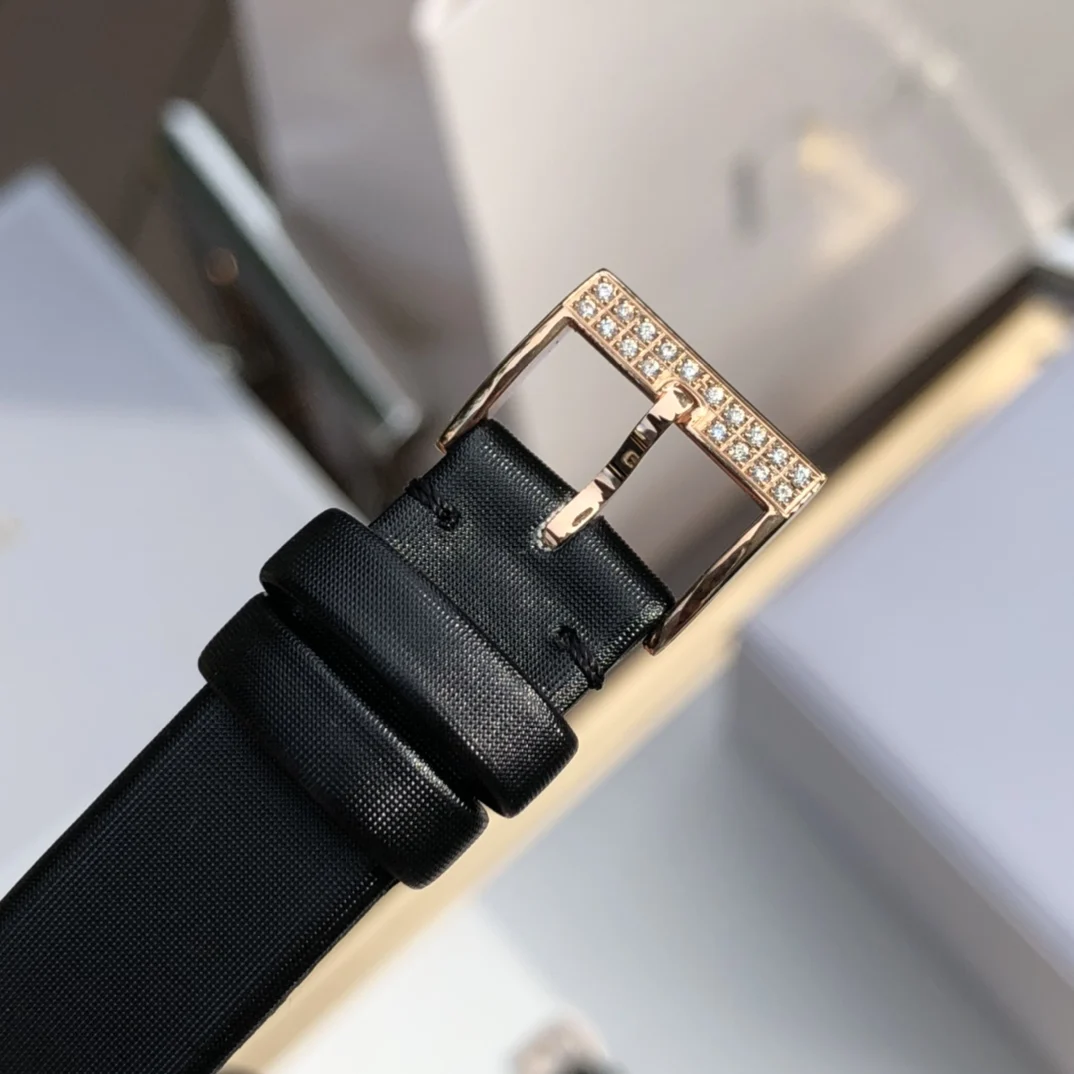 Black brushed satin calf leather strap — photographed off the sweep