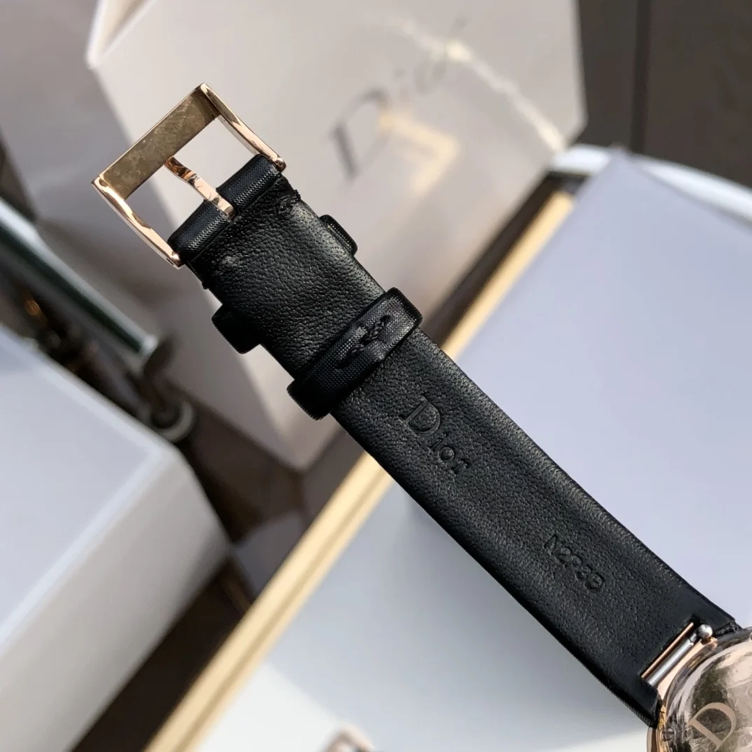 Black brushed satin calf leather strap — photographed off the sweep
