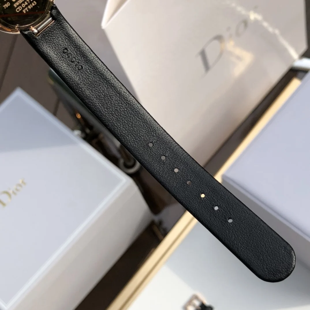 Black brushed satin calf leather strap — photographed off the sweep
