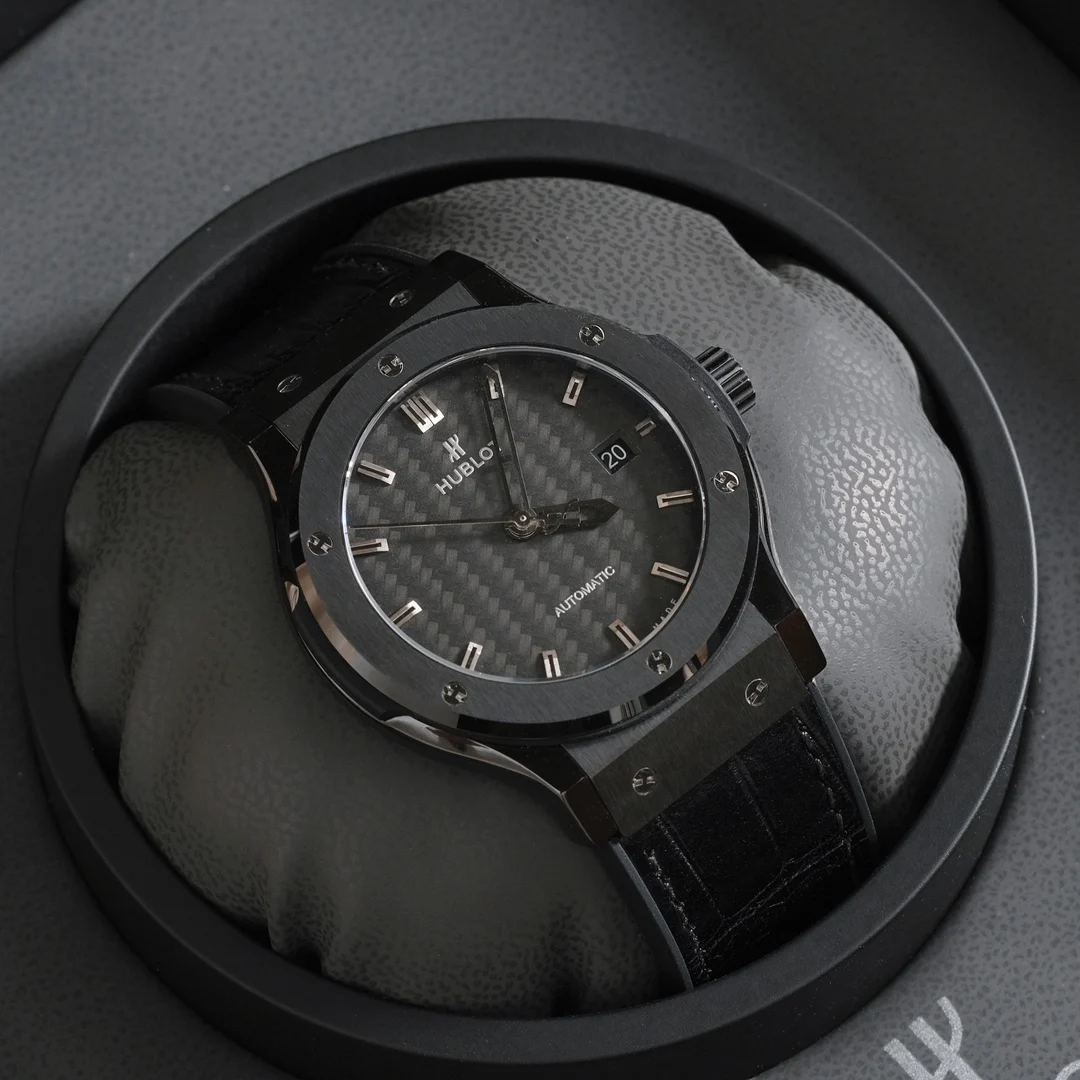Black carbon fiber style — photographed off the sweep