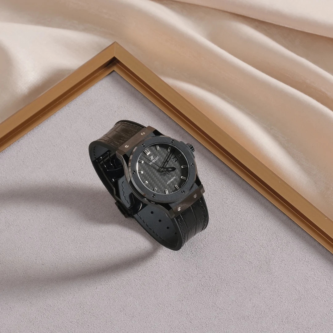 Black carbon fiber style — photographed off the sweep