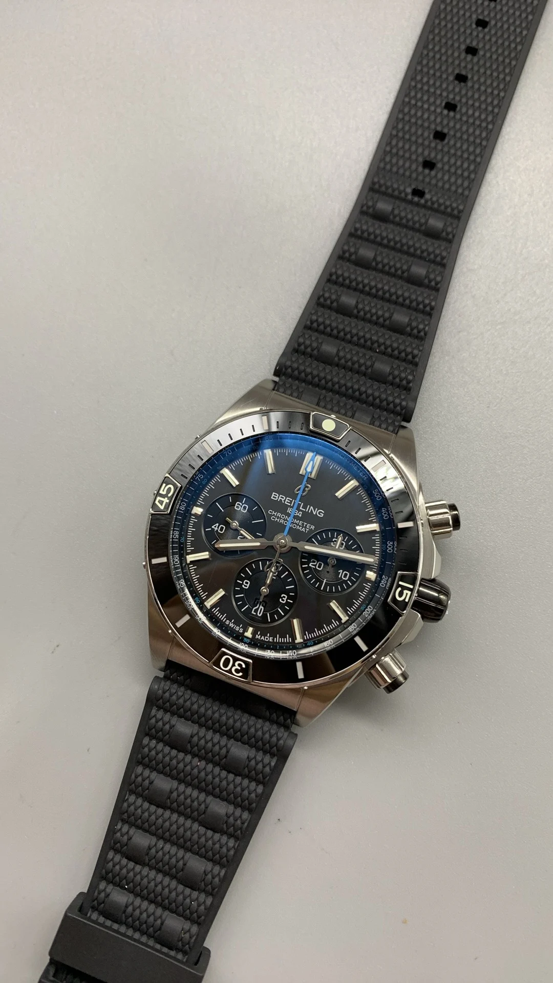 BLS, bullet-link bracelet, gray, ceramic bezel — photographed off the sweep