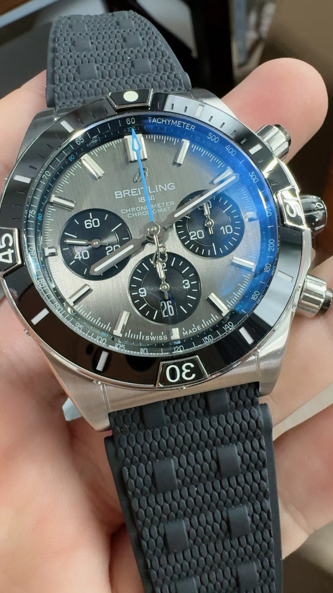 BLS, bullet-link bracelet, gray, ceramic bezel — photographed off the sweep