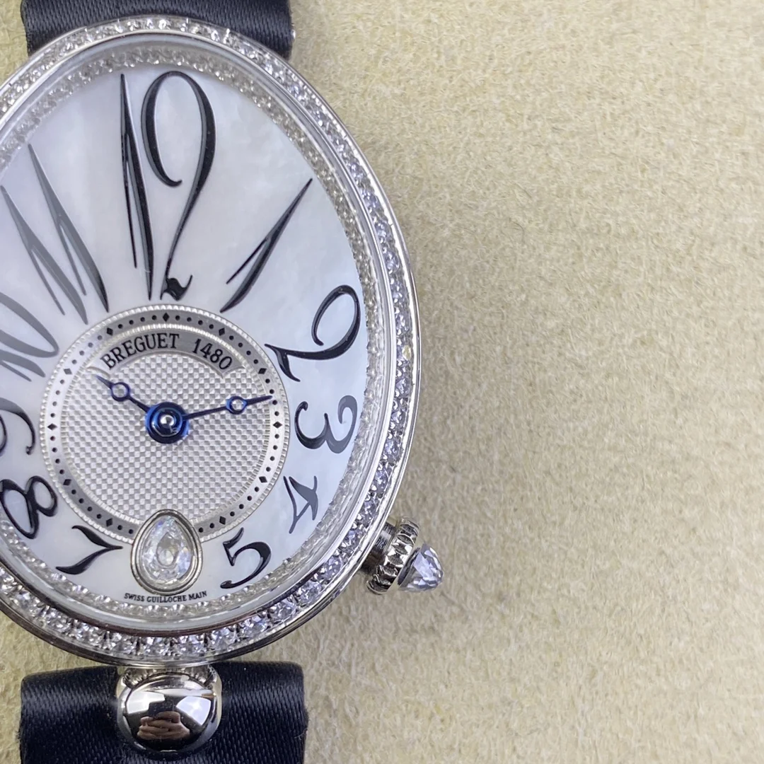 Breguet Reine de Naples 36.5 × 28.45mm — photographed off the sweep