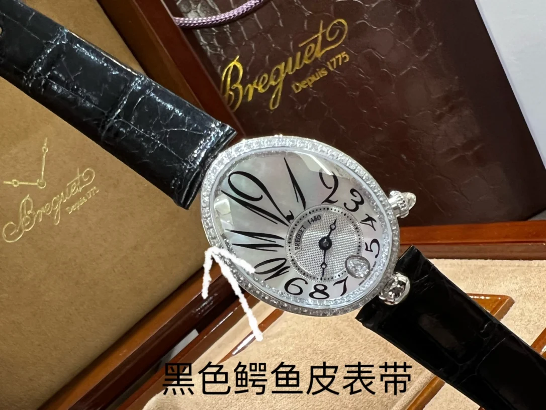 Breguet Reine de Naples Champagne Rose Gold Blue Dial 36.5 × 28.45mm — photographed off the sweep