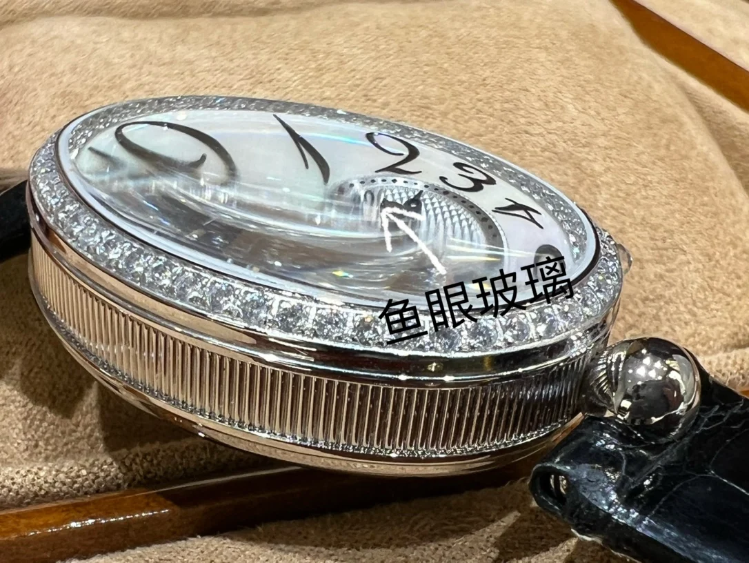 Breguet Reine de Naples Champagne Rose Gold Blue Dial 36.5 × 28.45mm — photographed off the sweep