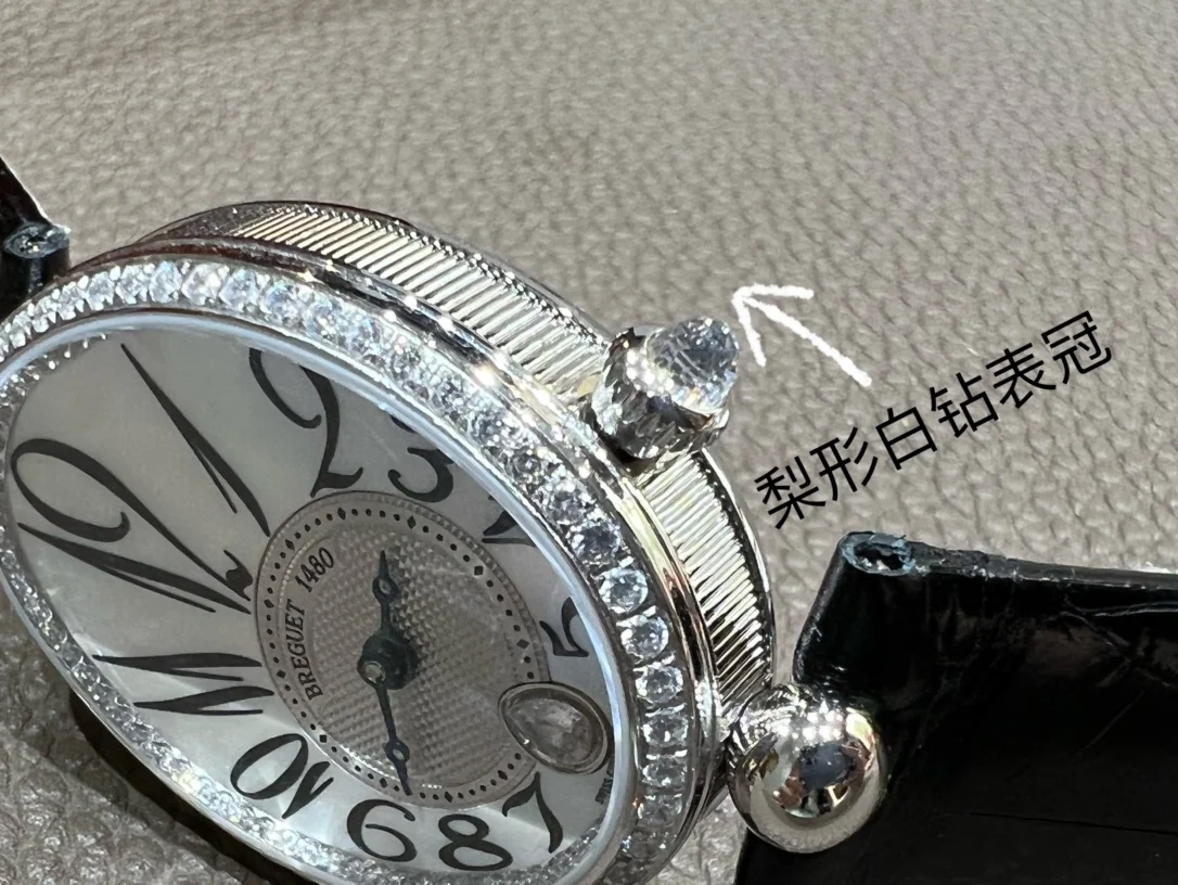 Breguet Reine de Naples Champagne Rose Gold Blue Dial 36.5 × 28.45mm — photographed off the sweep