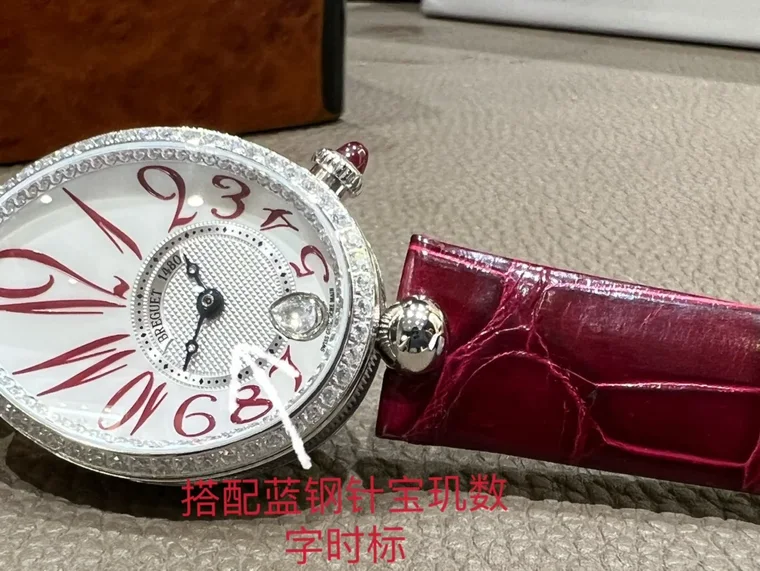 Breguet Reine de Naples Champagne Rose Gold Blue Dial 36.5 × 28.45mm