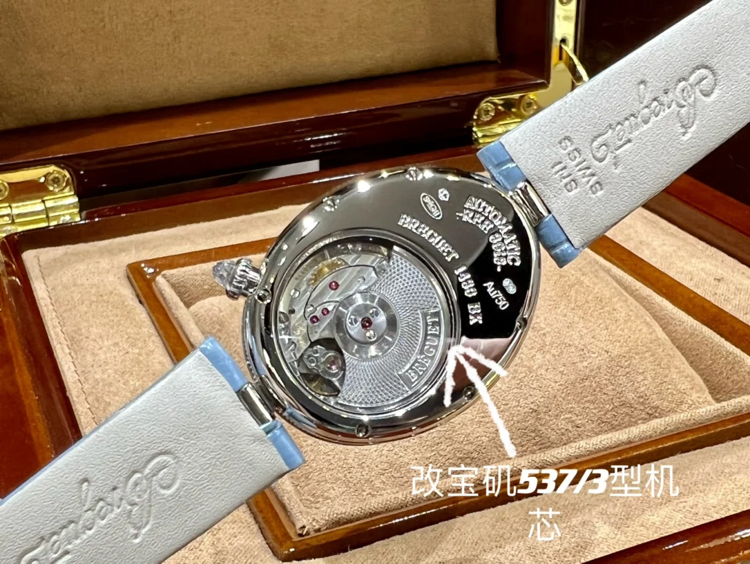 Breguet Reine de Naples Champagne Rose Gold Blue Dial 36.5 × 28.45mm — photographed off the sweep
