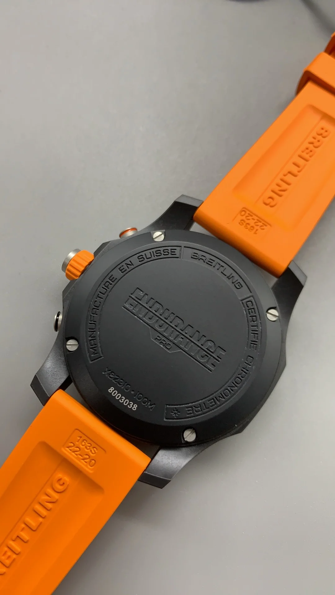Breitling Carbon Orange Dial — photographed off the sweep