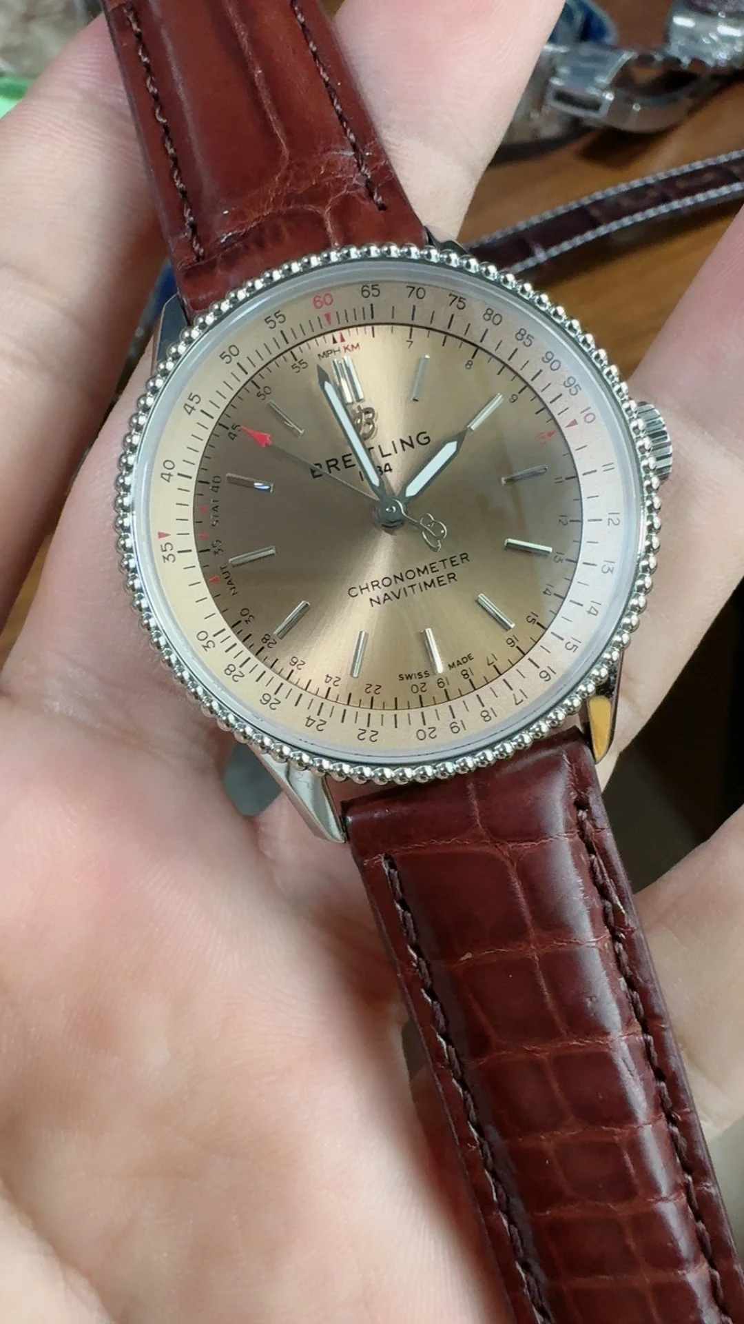 Breitling Navitimer Champagne β photographed off the sweep