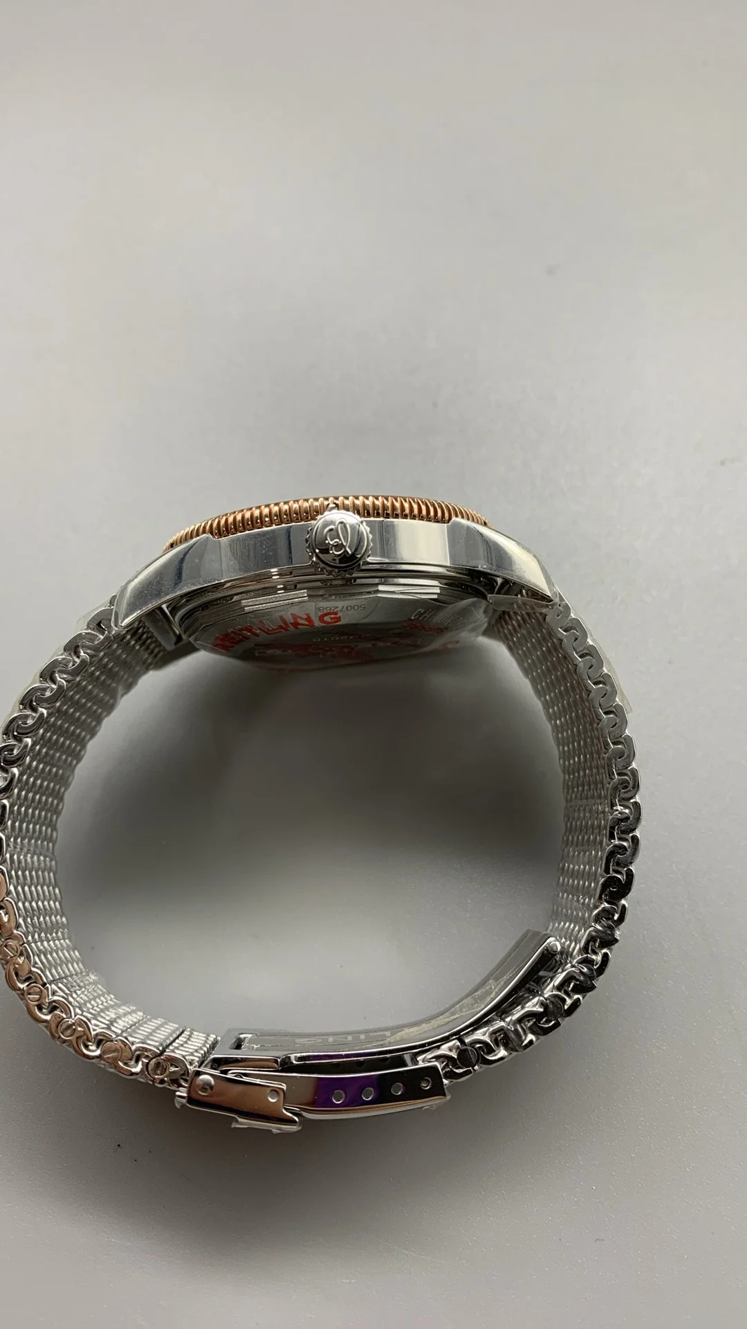 Breitling Superocean Rose Gold Black Dial — photographed off the sweep