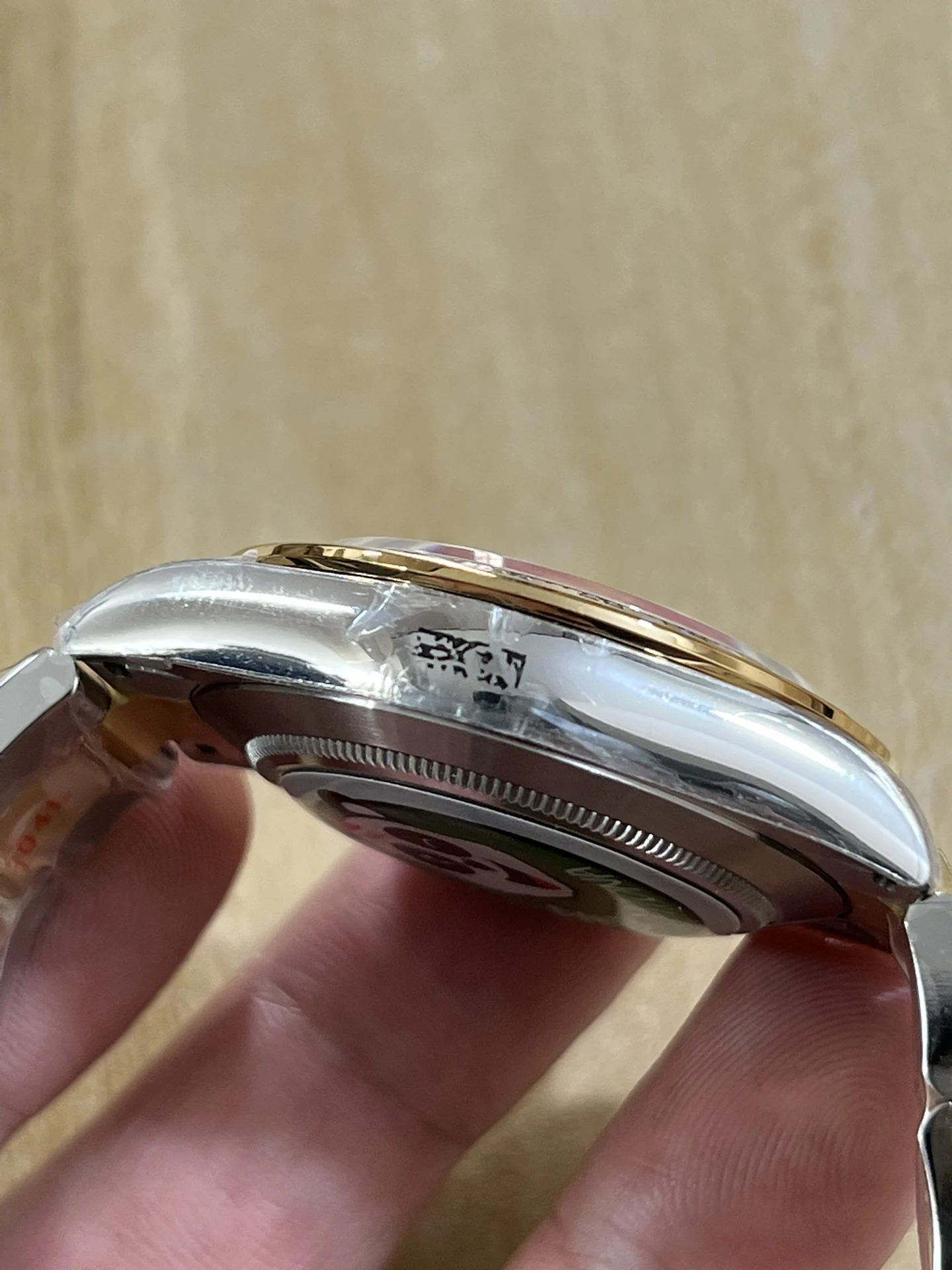 BT4130 two-tone steel and gold DI — photographed off the sweep