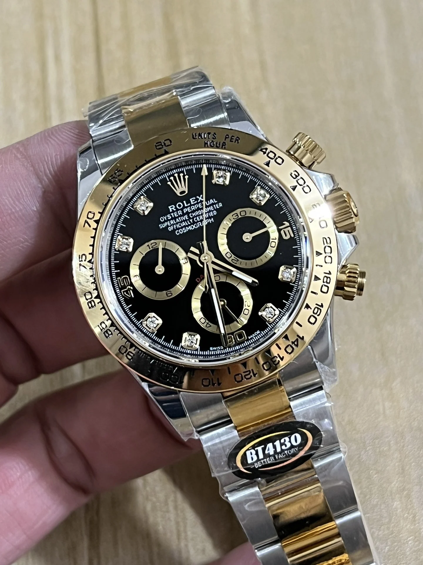 BT4130 two-tone steel and gold, three-section spliced granules — photographed off the sweep