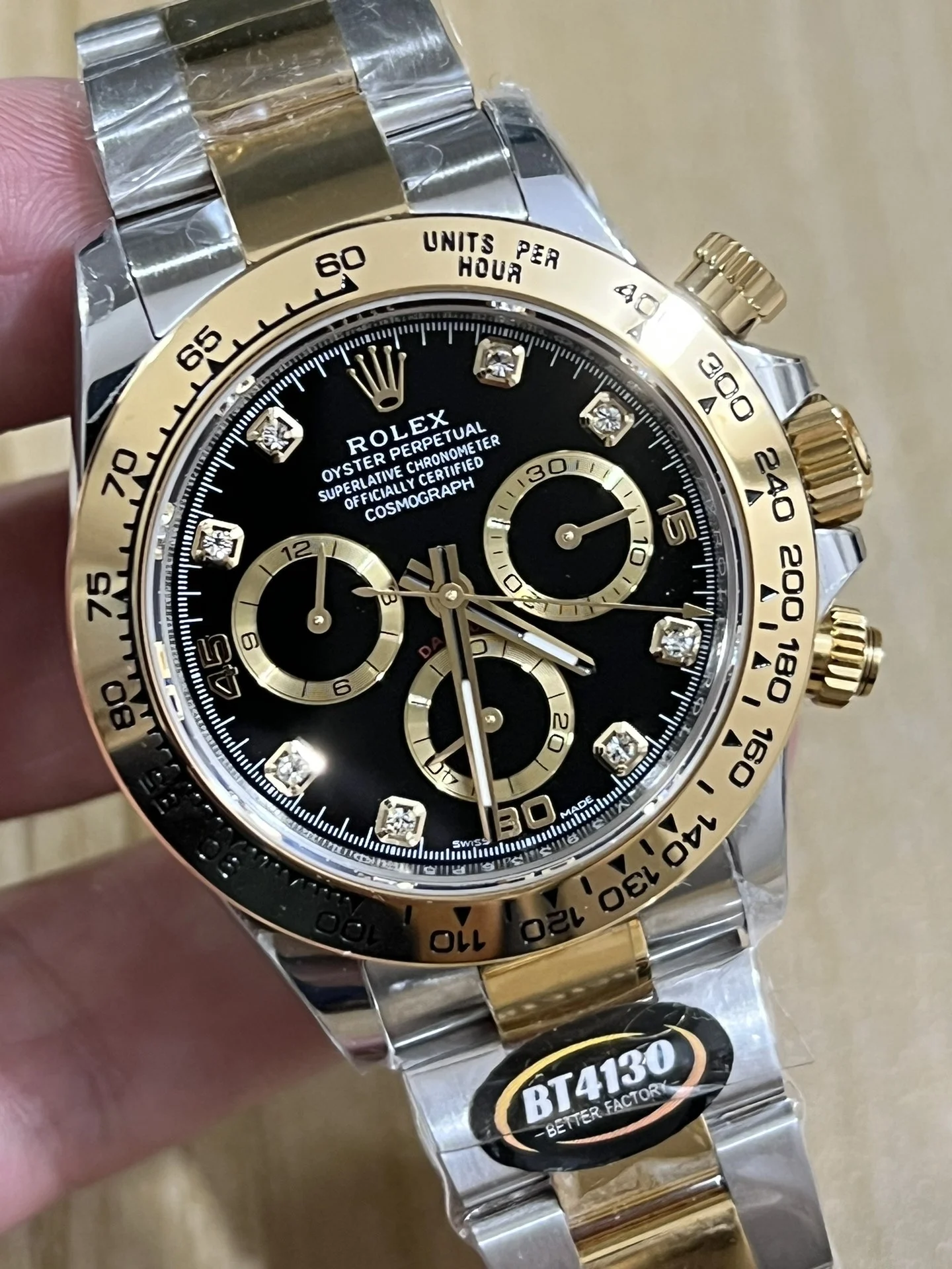 BT4130 two-tone steel and gold, three-section spliced granules — photographed off the sweep