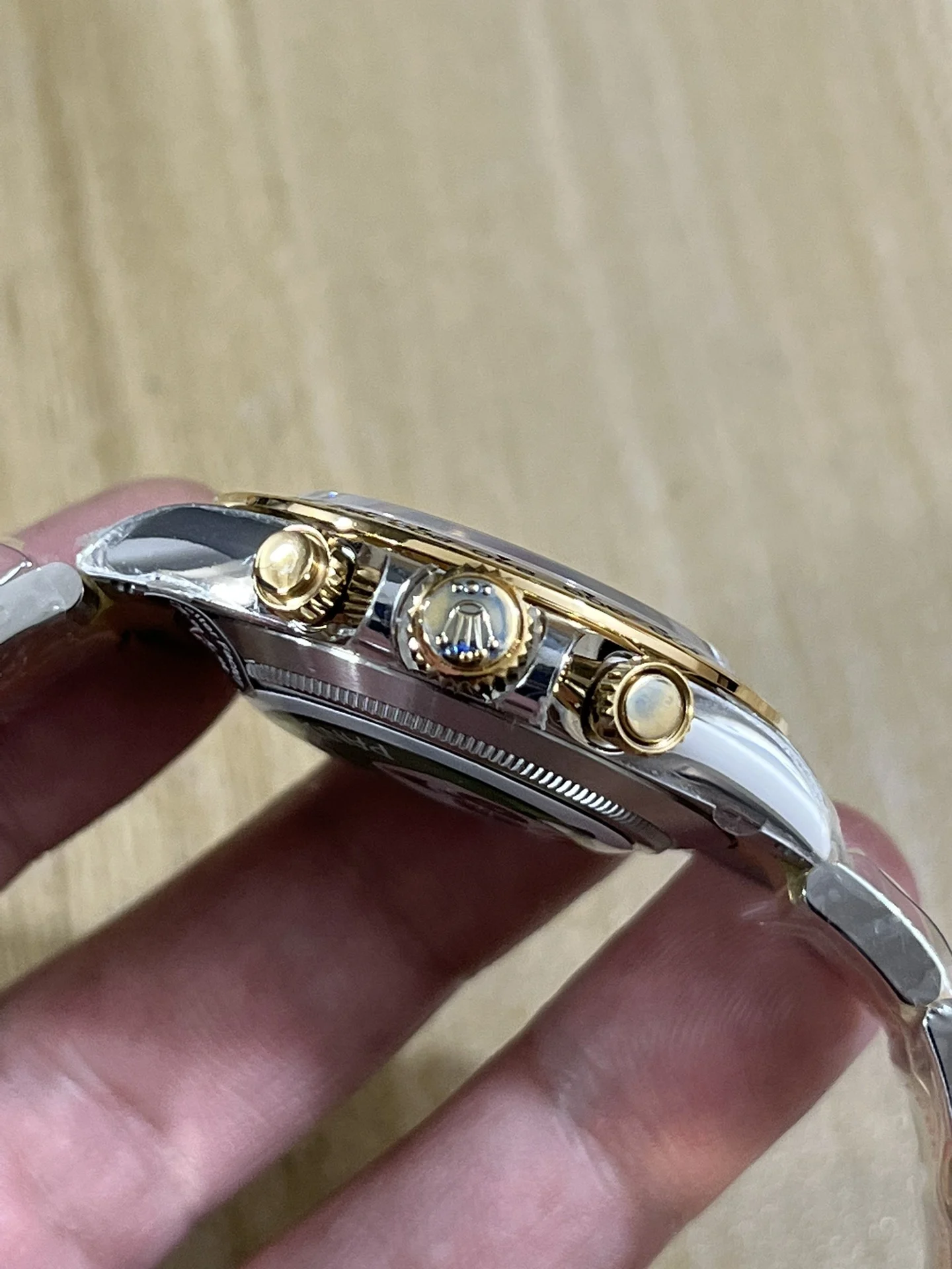 BT4130 two-tone steel and gold, three-section spliced granules — photographed off the sweep
