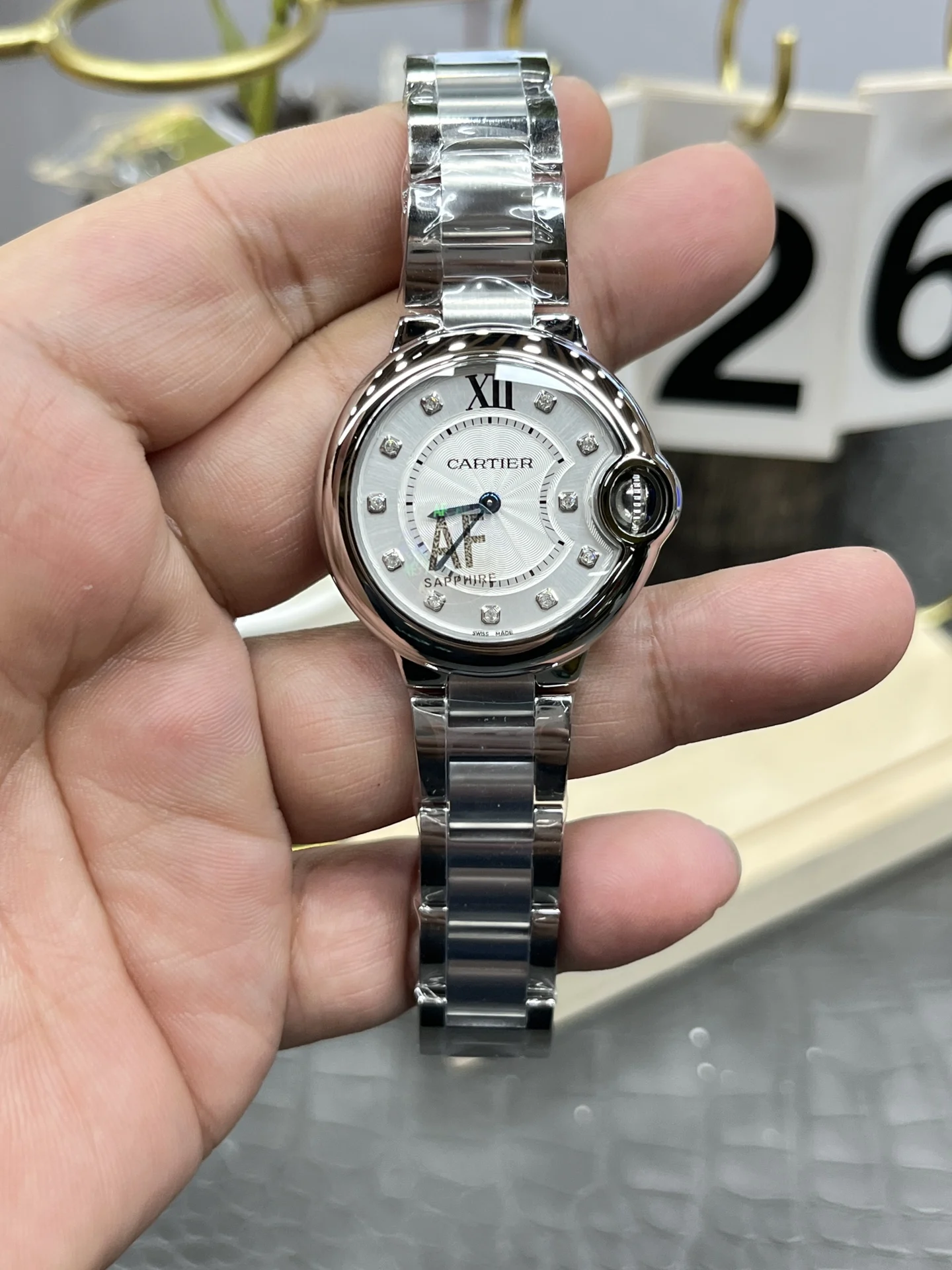 Cartier Ballon Bleu 33mm — photographed off the sweep
