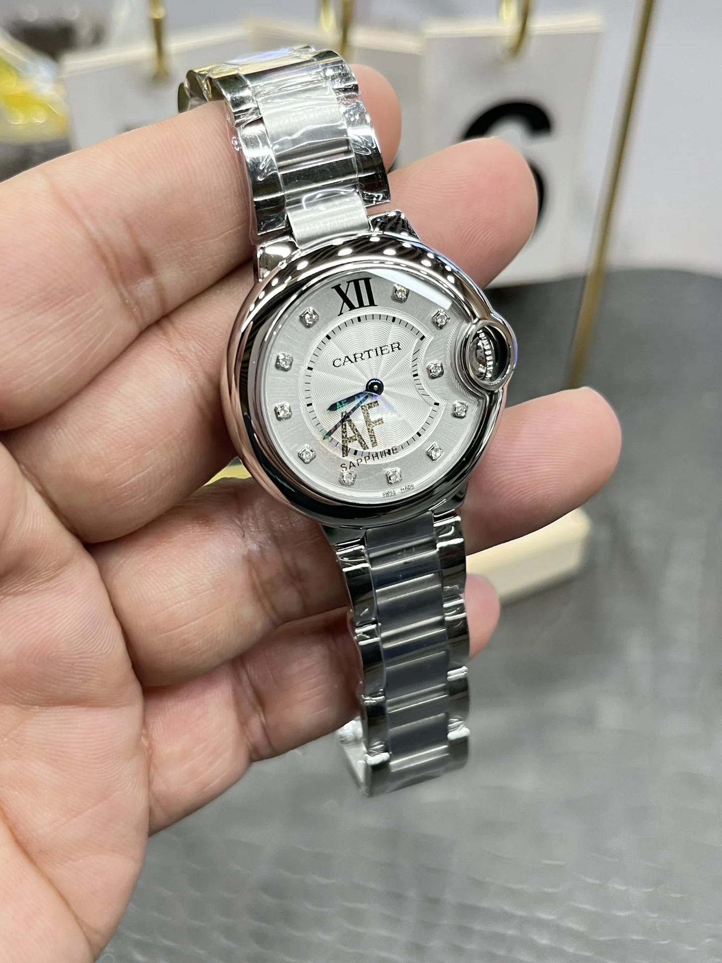 Cartier Ballon Bleu 33mm — photographed off the sweep