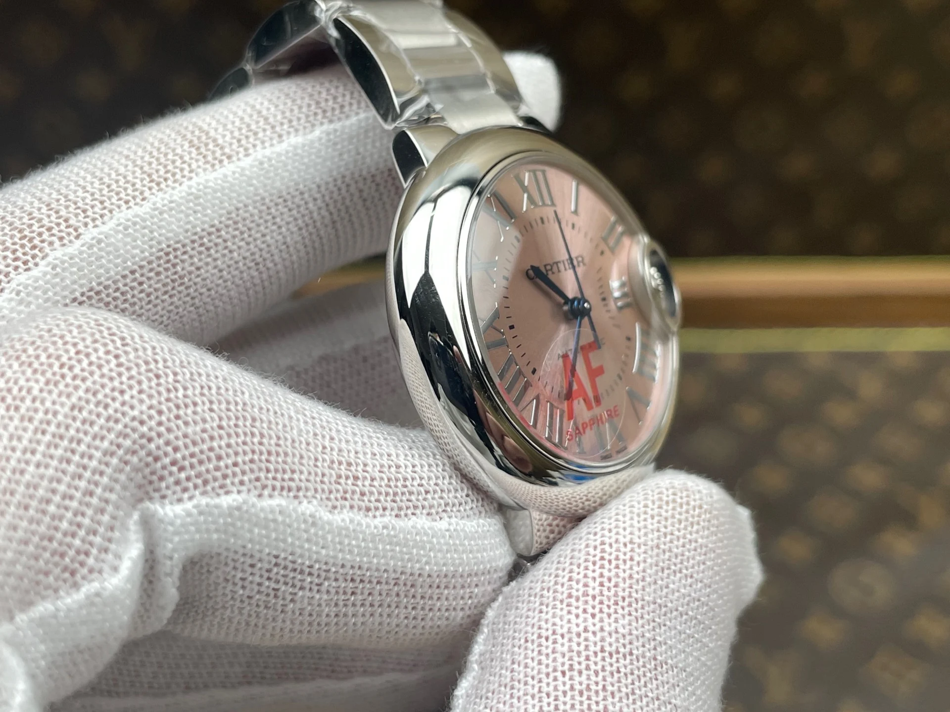 Cartier Ballon Bleu Pink Dial 33mm — photographed off the sweep