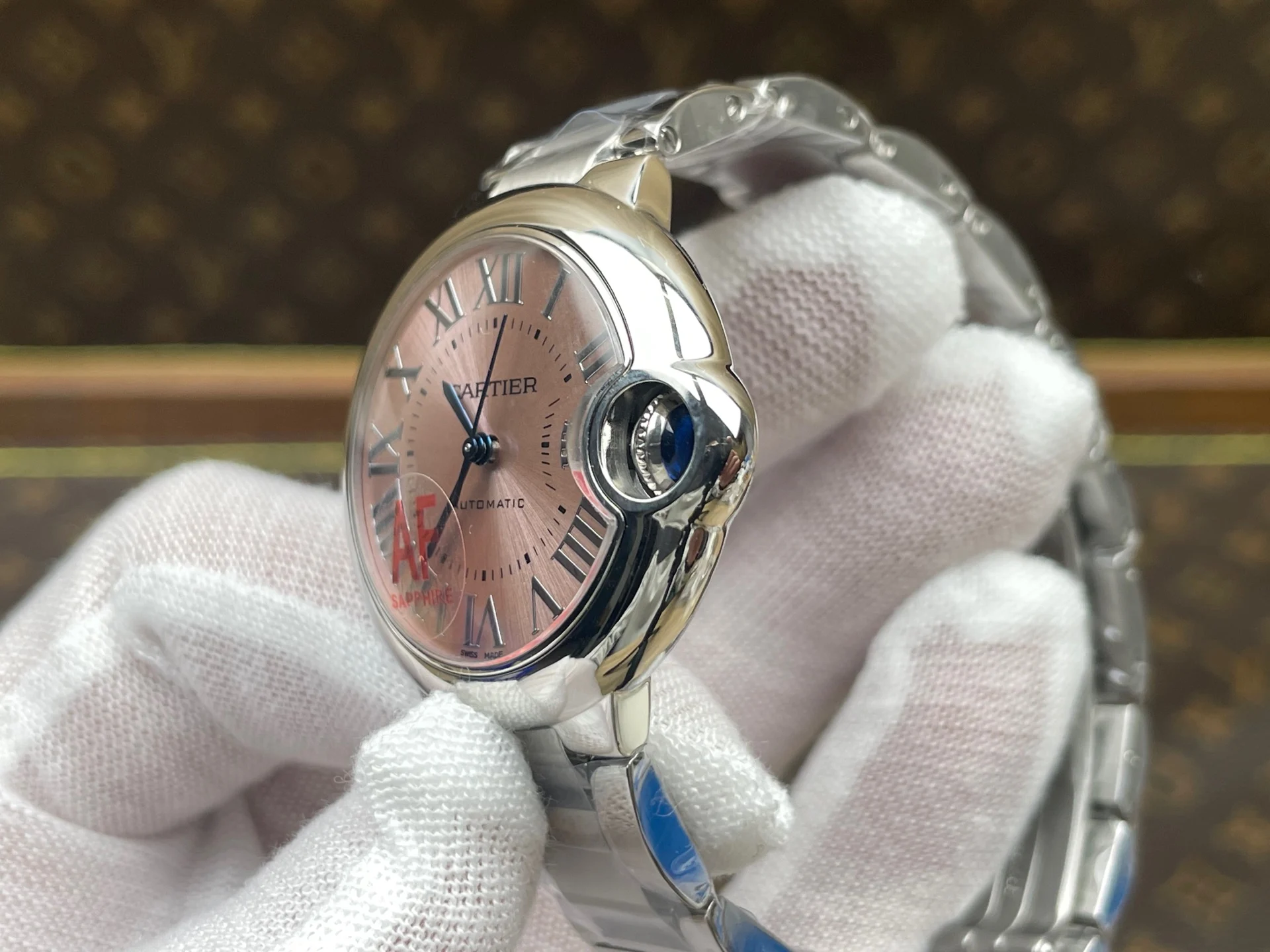 Cartier Ballon Bleu Pink Dial 33mm — photographed off the sweep