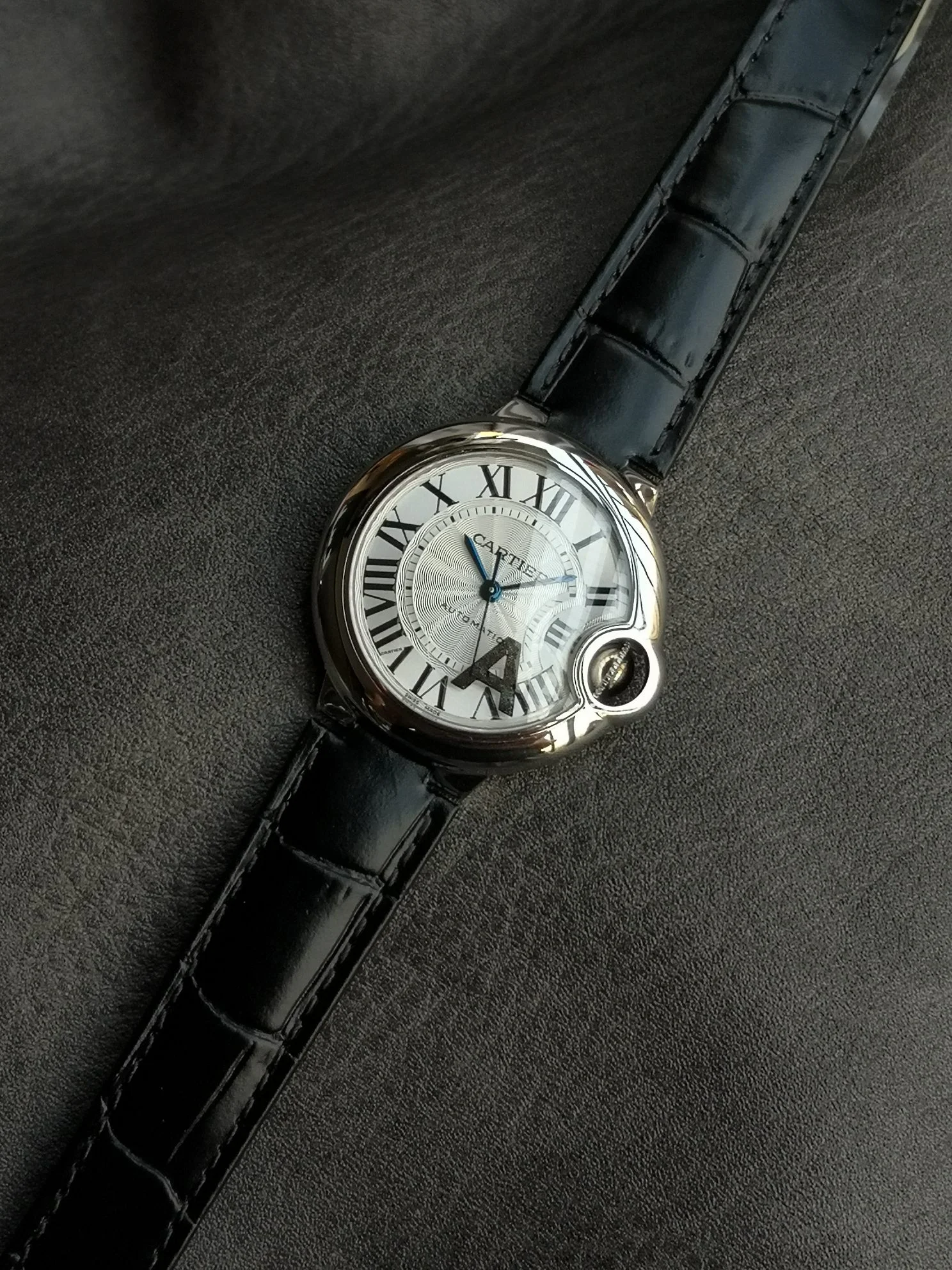 Cartier Ballon Bleu Steel White Dial 42mm — photographed off the sweep