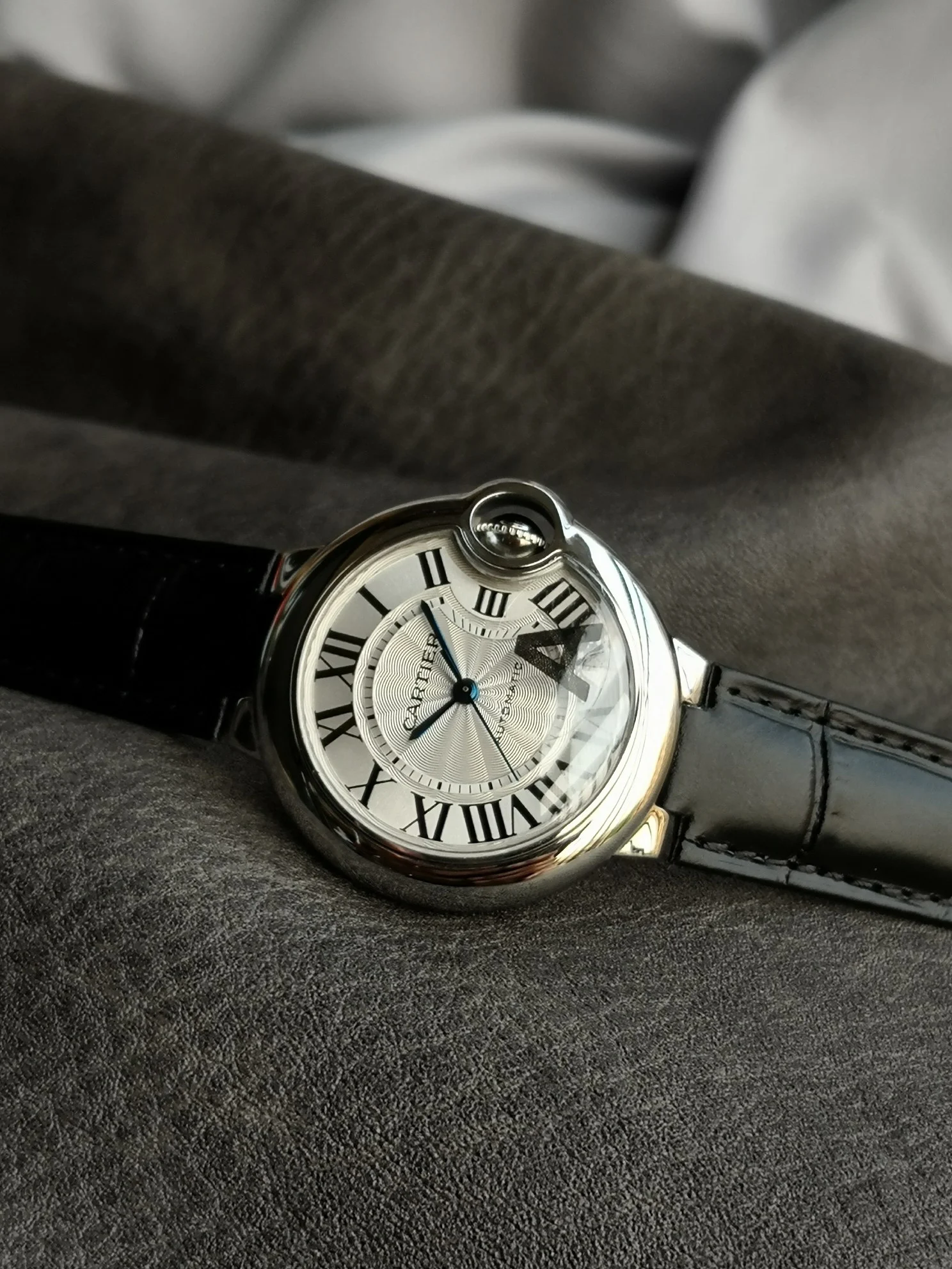 Cartier Ballon Bleu Steel White Dial 42mm — photographed off the sweep