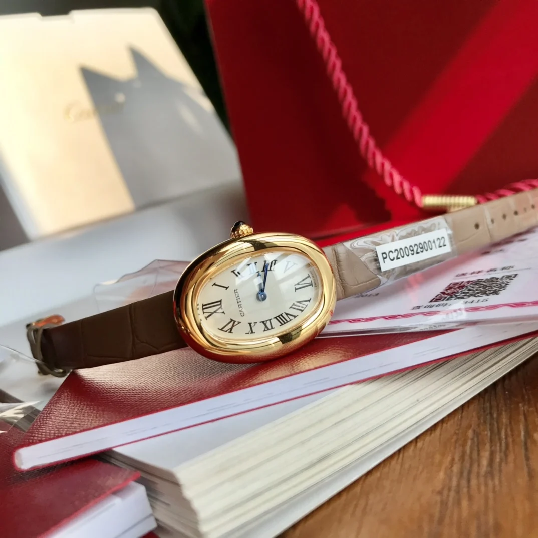 Cartier Ballon Bleu Yellow Gold Silver Dial 32 × 26mm — photographed off the sweep