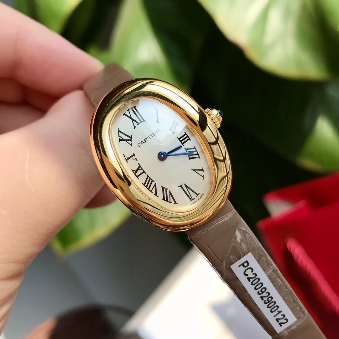 Cartier Ballon Bleu Yellow Gold Silver Dial 32 × 26mm — photographed off the sweep