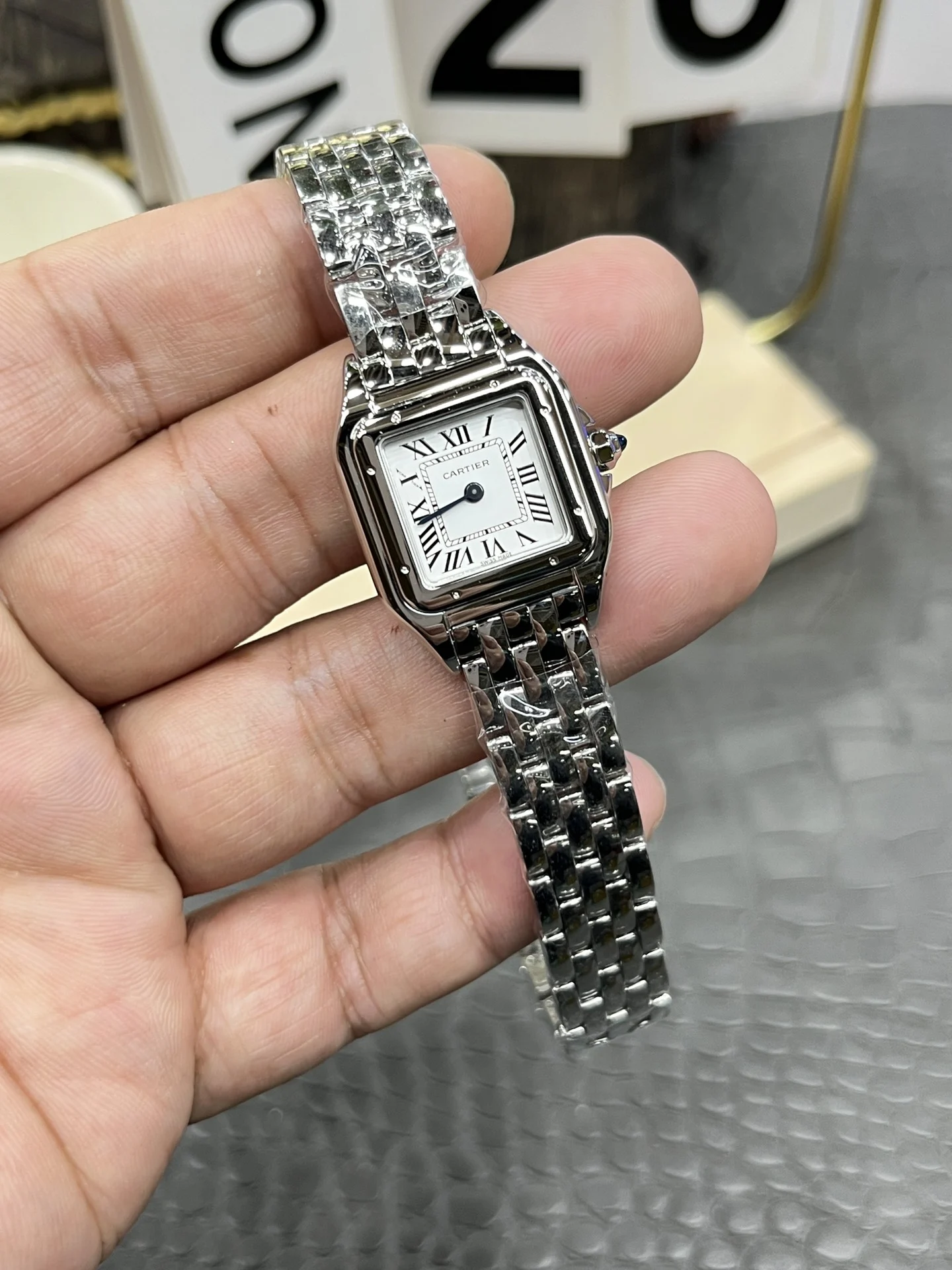 Cartier Panthère 22mm — photographed off the sweep