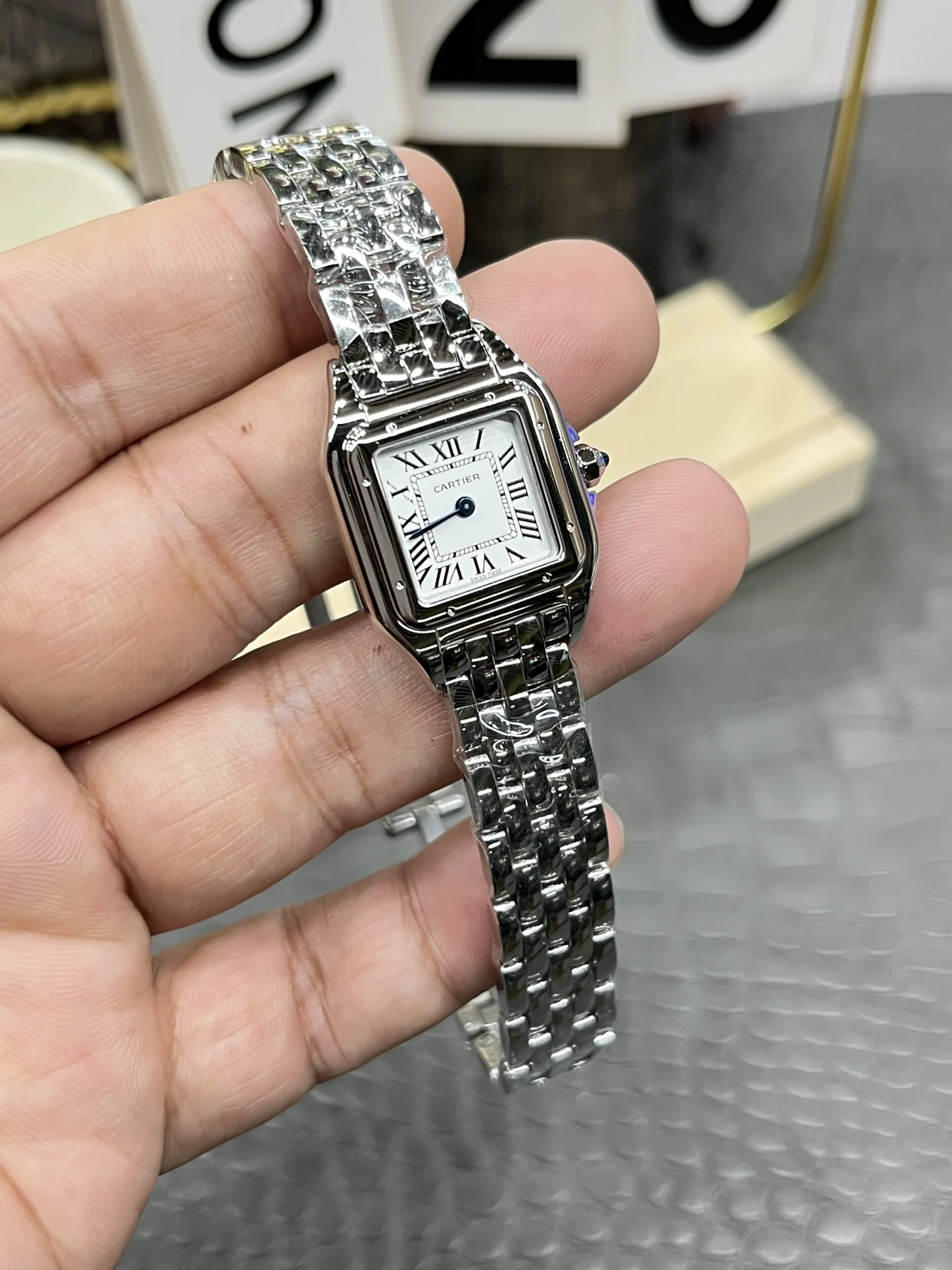 Cartier Panthère 22mm — photographed off the sweep