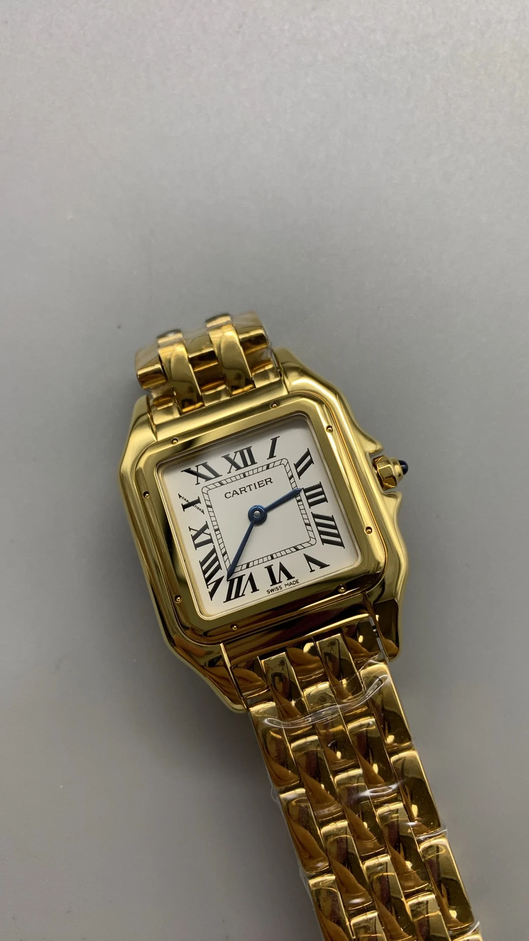 Cartier Panthère Two-Tone 27mm — photographed off the sweep