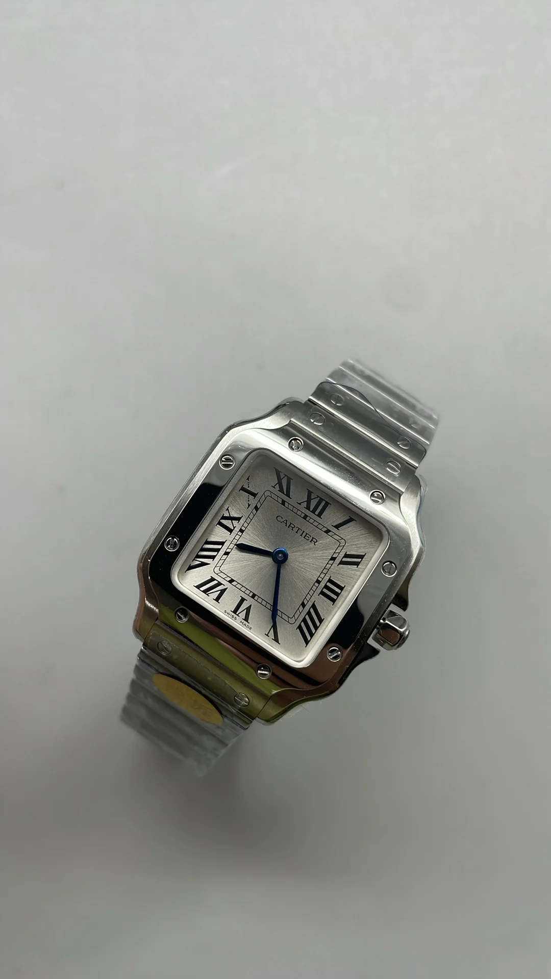 Cartier Santos 27mm — photographed off the sweep