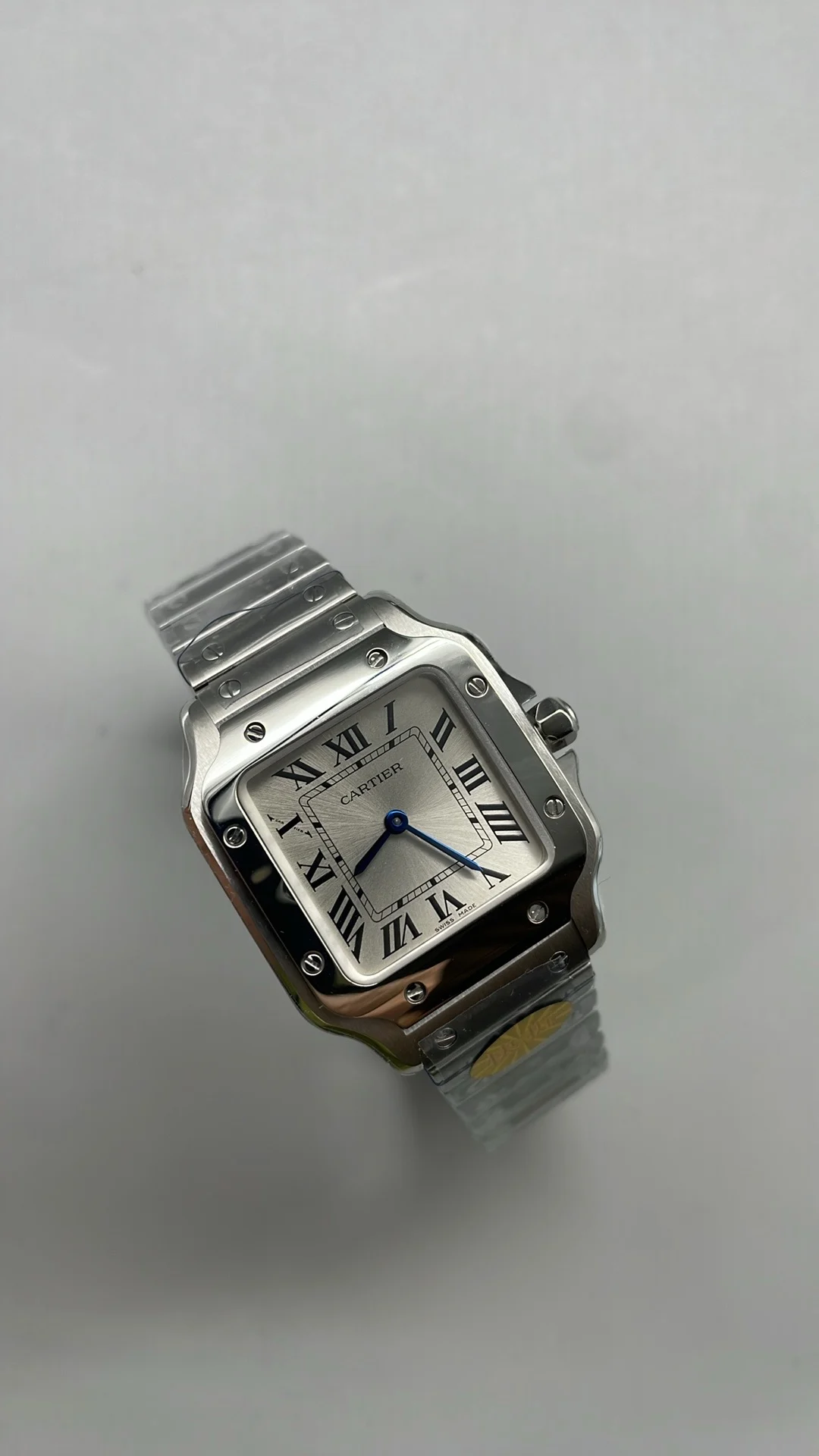 Cartier Santos 27mm — photographed off the sweep