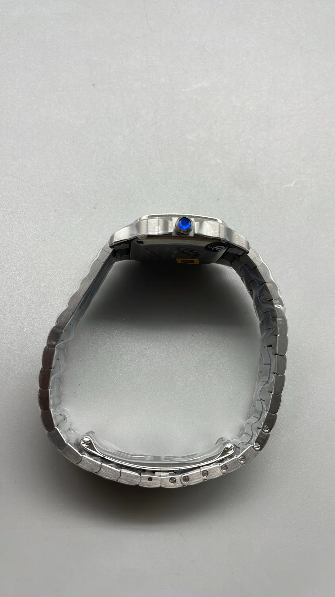 Cartier Santos 27mm — photographed off the sweep