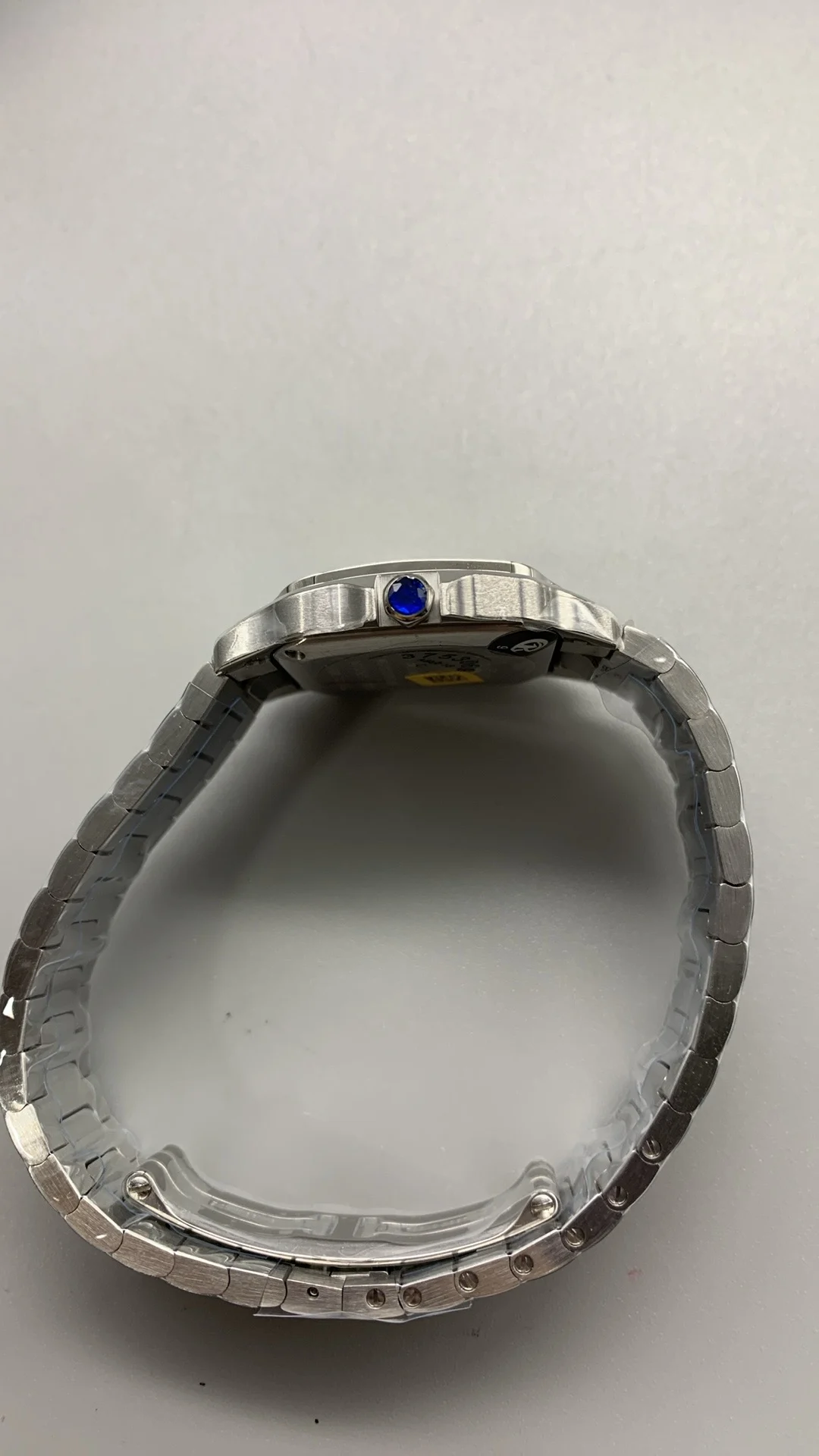 Cartier Santos 27mm — photographed off the sweep