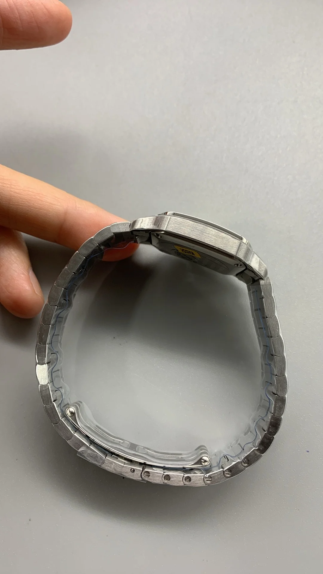 Cartier Santos 27mm — photographed off the sweep