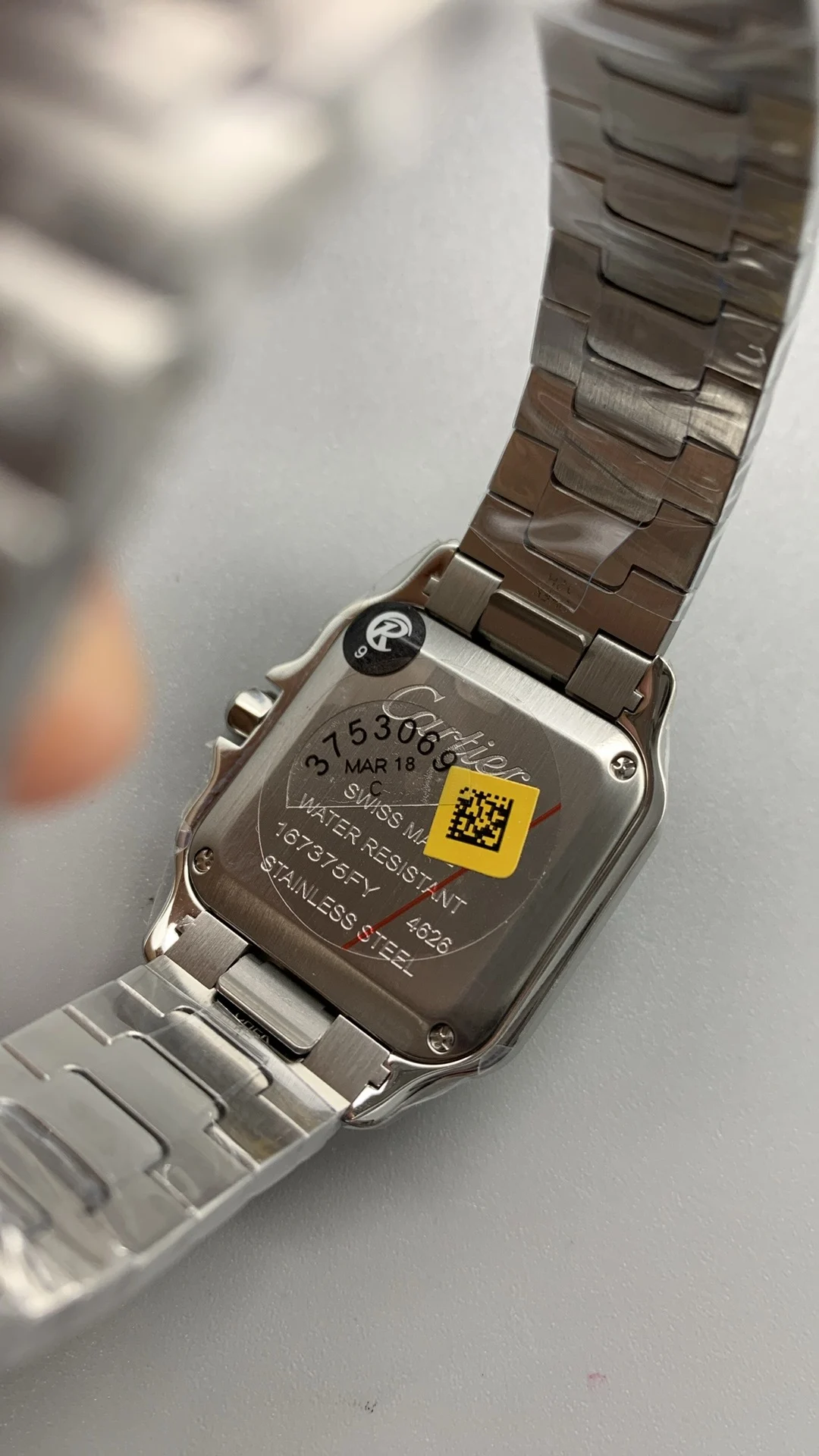 Cartier Santos 27mm — photographed off the sweep