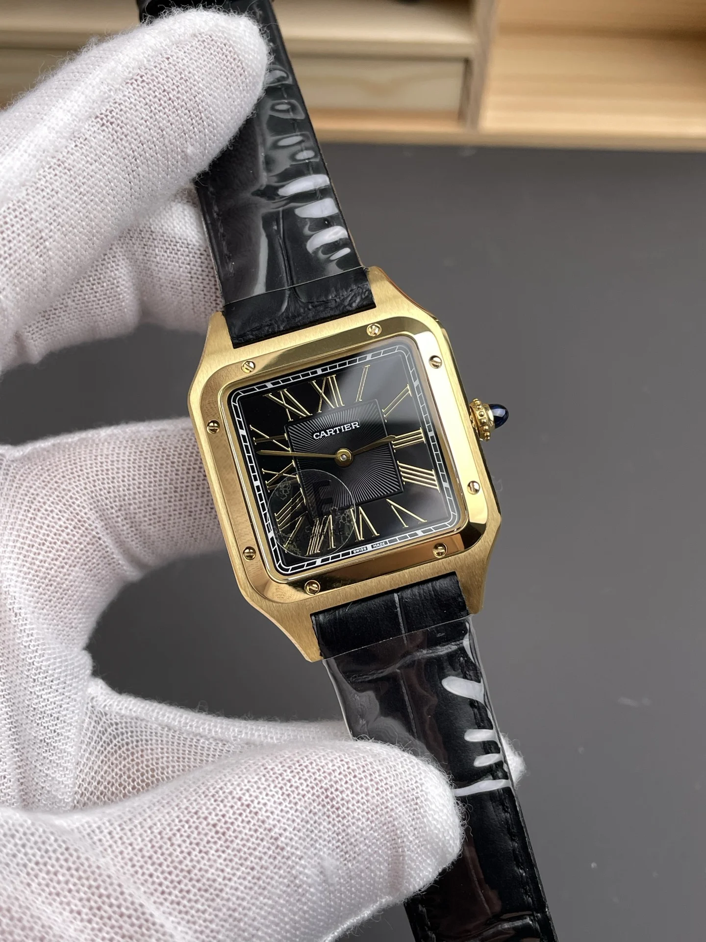 Cartier Santos Black Dial 31.4 × 43.5mm — photographed off the sweep