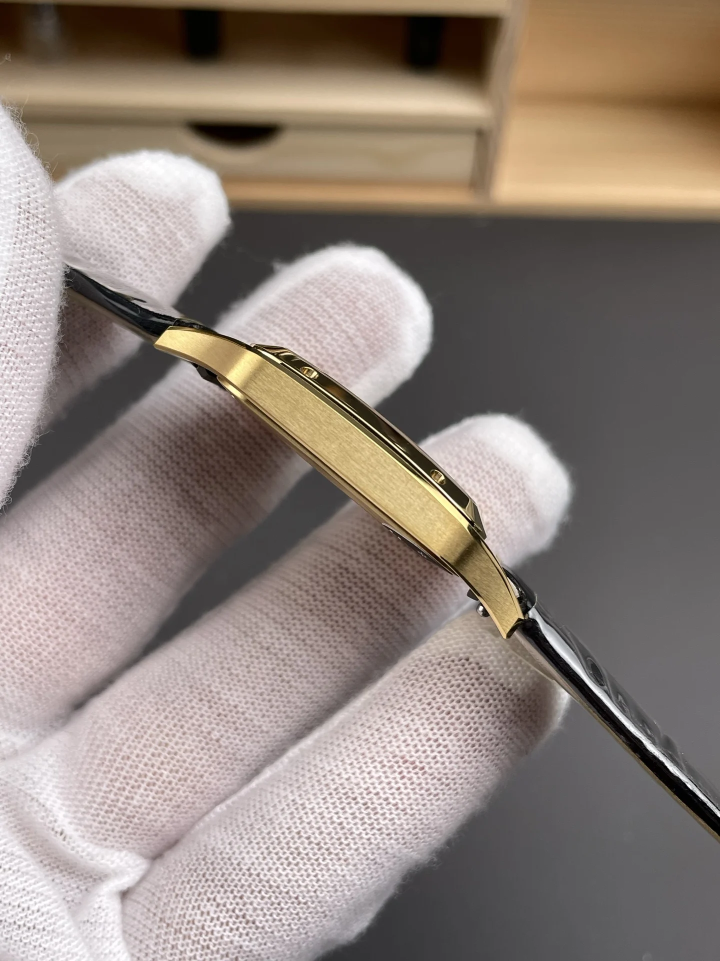 Cartier Santos Black Dial 31.4 × 43.5mm — photographed off the sweep