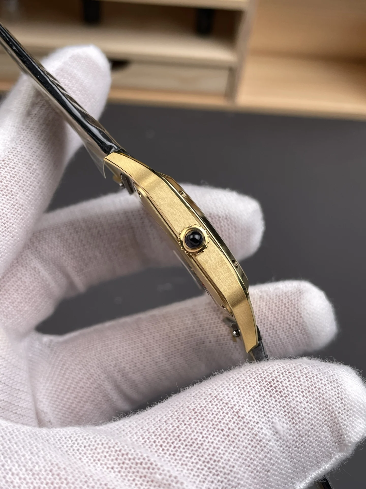 Cartier Santos Black Dial 31.4 × 43.5mm — photographed off the sweep